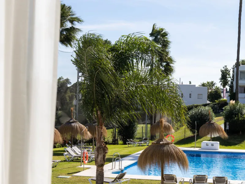 Welcome to this elegant 2-bedroom apartment, ideally positioned on the top floor in the heart of Nueva Andalucía—overlooking the renowned Aloha Golf Course and offering spectacular sea, mountain, and golf views. This thoughtfully renovated home combines m
