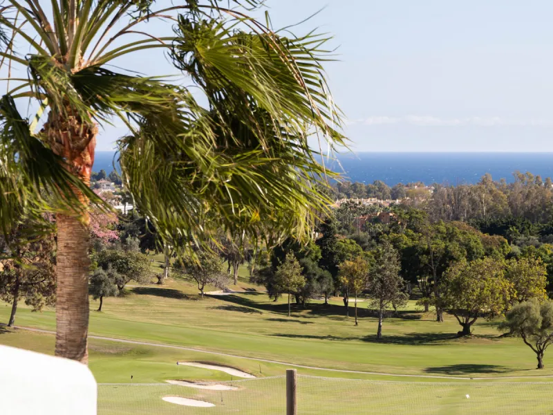 Welcome to this elegant 2-bedroom apartment, ideally positioned on the top floor in the heart of Nueva Andalucía—overlooking the renowned Aloha Golf Course and offering spectacular sea, mountain, and golf views. This thoughtfully renovated home combines m