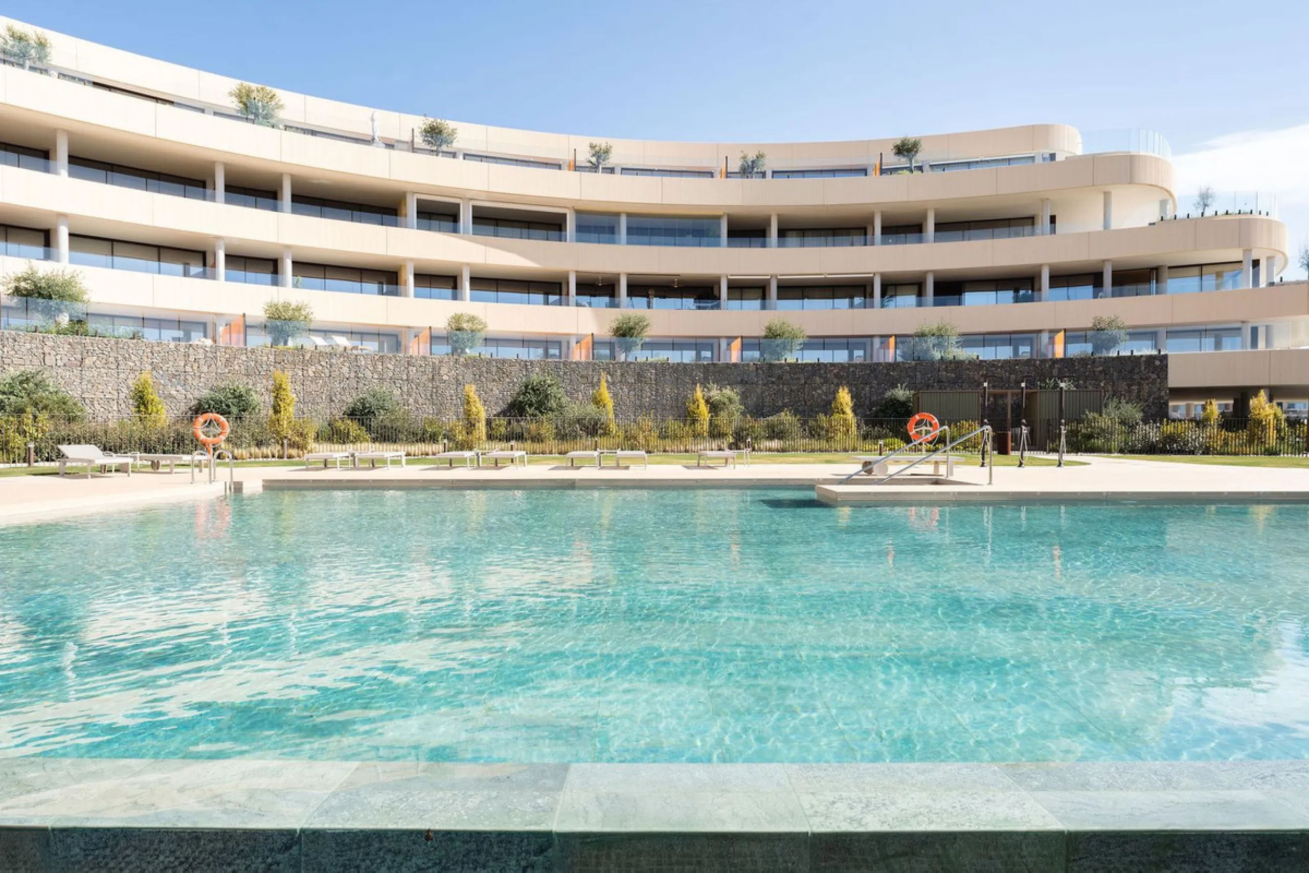 Experience refined coastal living in this brand-new luxury apartment set within the prestigious Higuerón Resort.