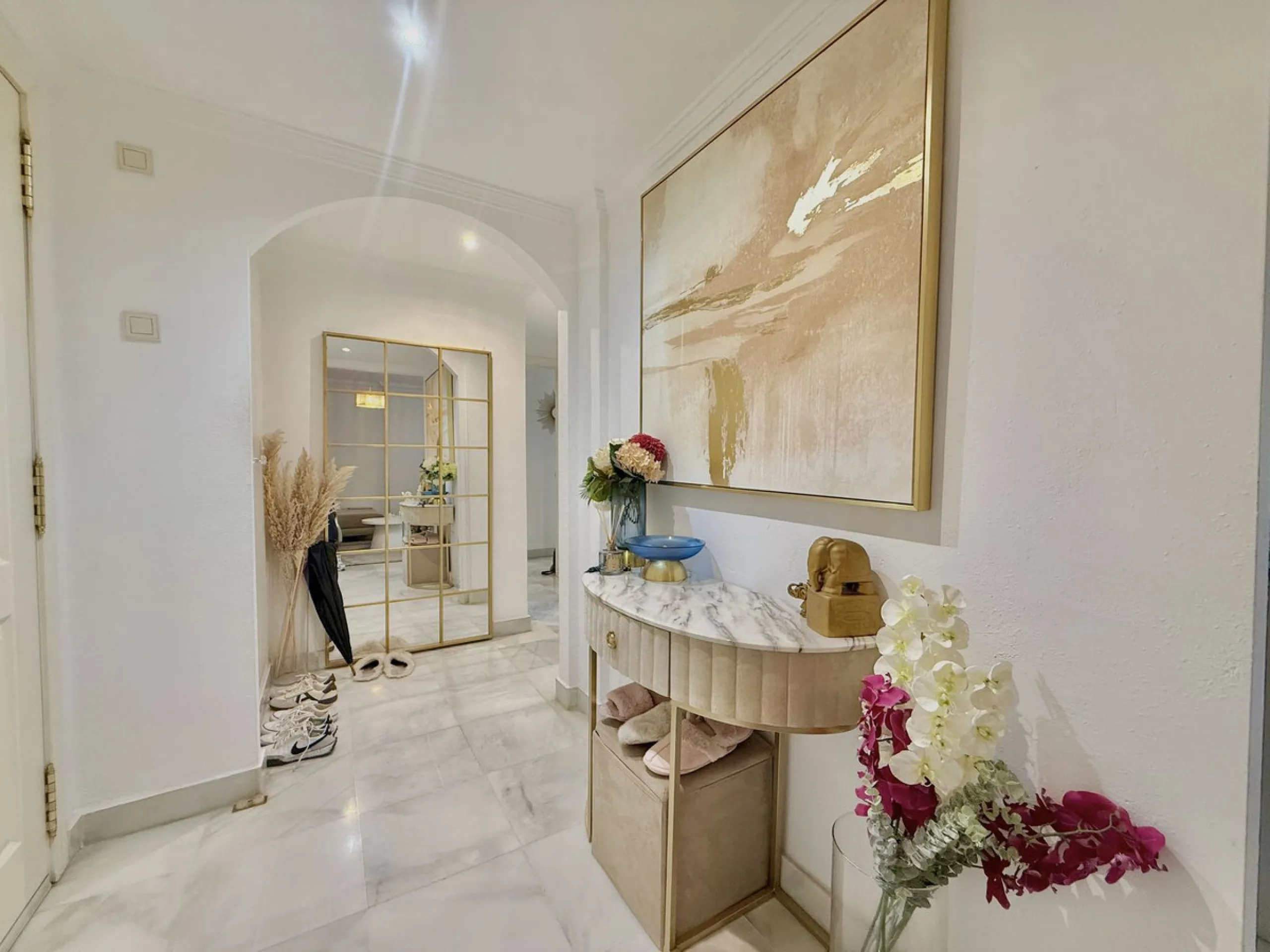 Located in a prestigious urbanization in Nagüeles, within the exclusive neighborhood of La Carolina, Guadalpin, Marbella, this property offers a unique lifestyle. The layout includes an entrance hall that leads to two bedrooms, two bathrooms, a spacious l