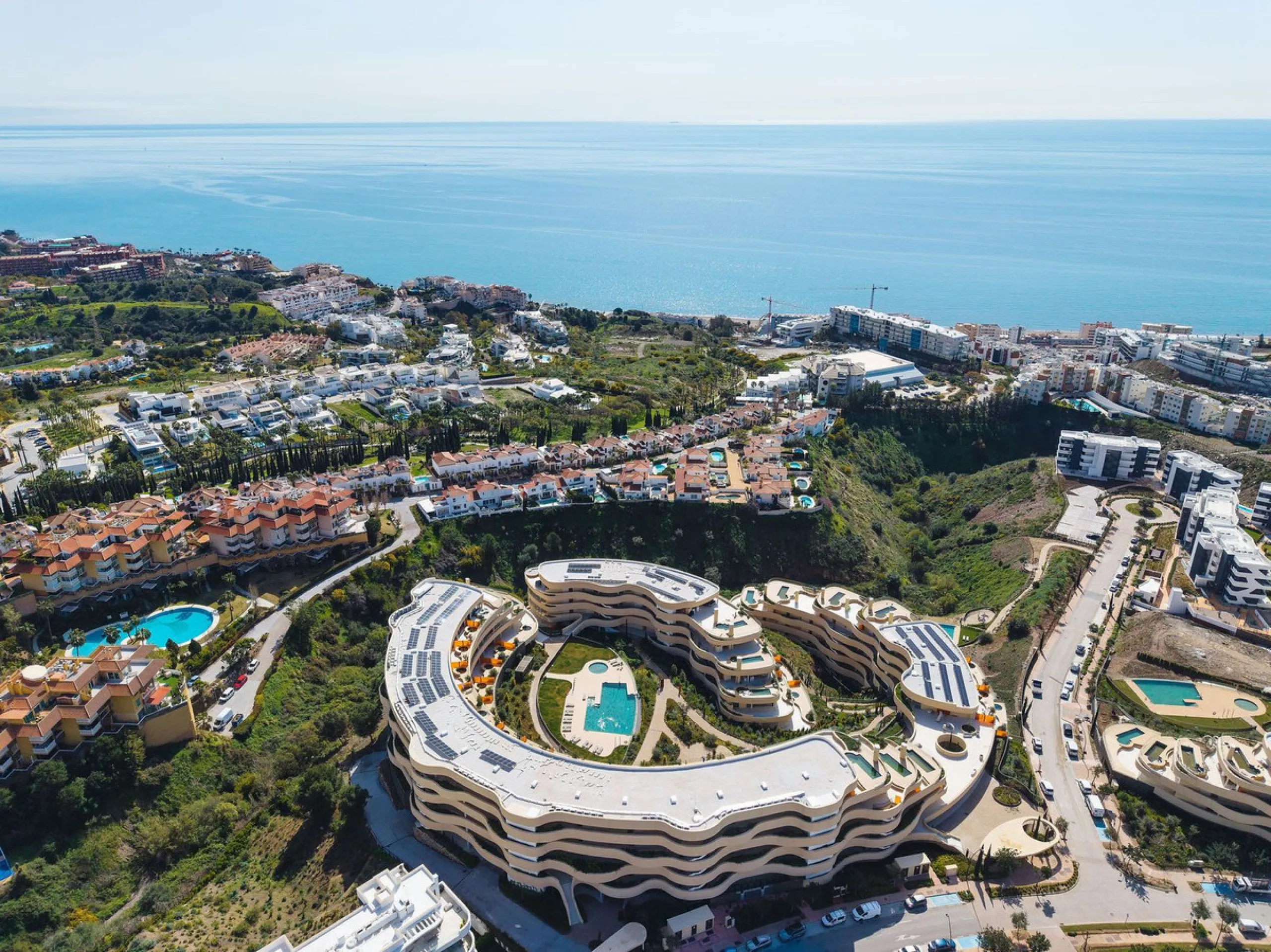 Experience refined coastal living in this brand-new luxury apartment set within the prestigious Higuerón Resort.