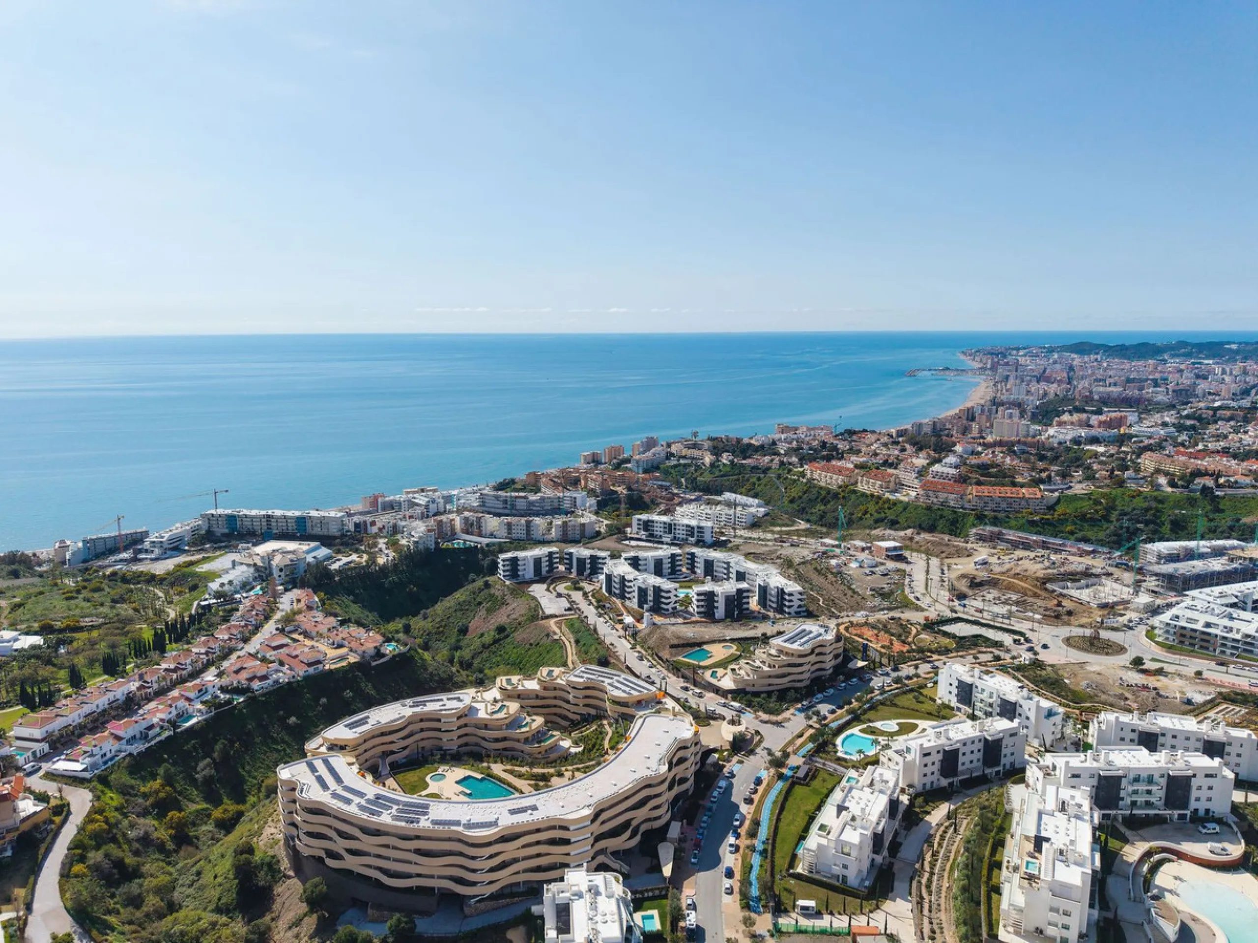 Experience refined coastal living in this brand-new luxury apartment set within the prestigious Higuerón Resort.