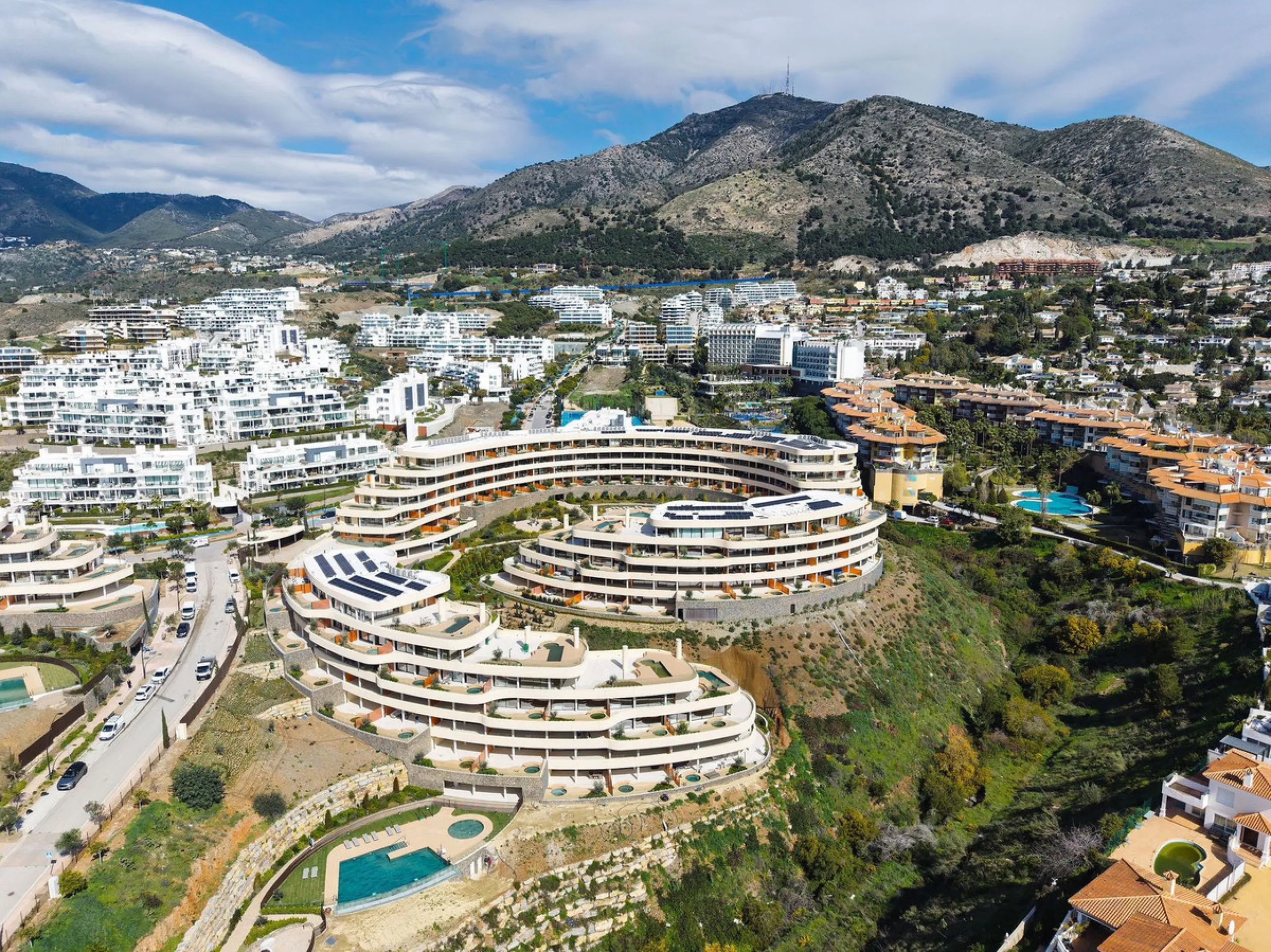 Experience refined coastal living in this brand-new luxury apartment set within the prestigious Higuerón Resort.