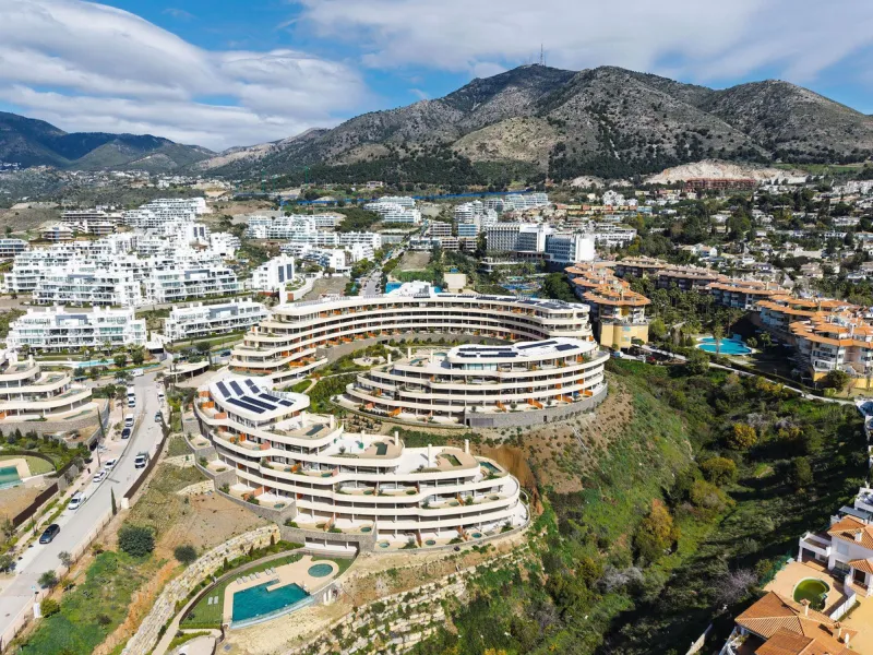 Experience refined coastal living in this brand-new luxury apartment set within the prestigious Higuerón Resort.