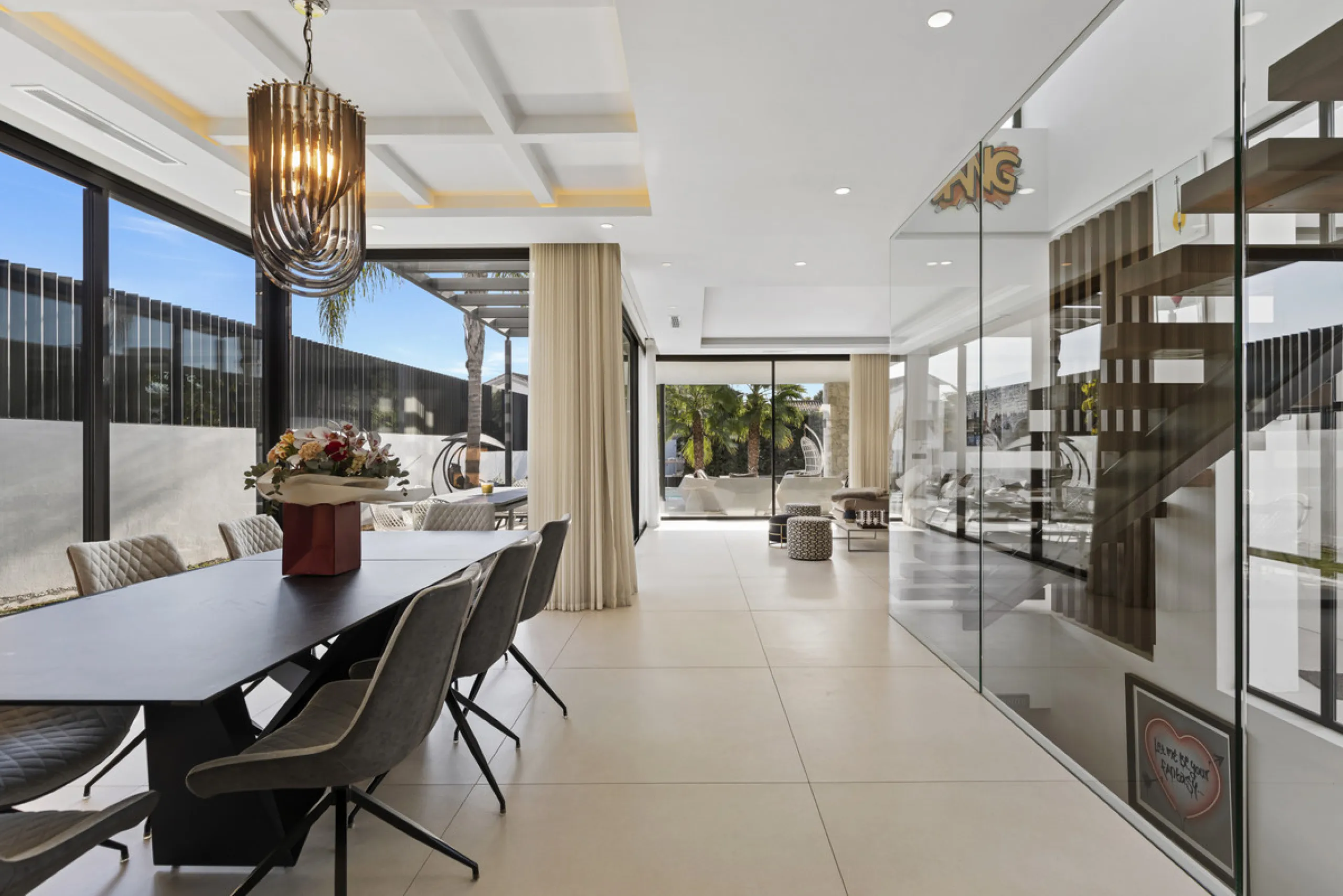 Experience the perfect blend of contemporary design and beachside living in this stunning modern villa in San Pedro de Alcántara. Bathed in natural light, the home features sleek, open-plan living with a spacious kitchen and dining area, an office, and a 