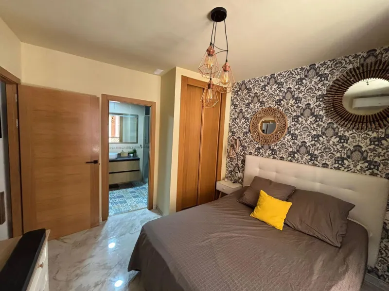 Imagine living on a street full of history — where every corner breathes art, and the sound of laughter and café terraces blends with the sea breeze. This apartment offers exactly that: a charming home right in the historic center of Málaga.