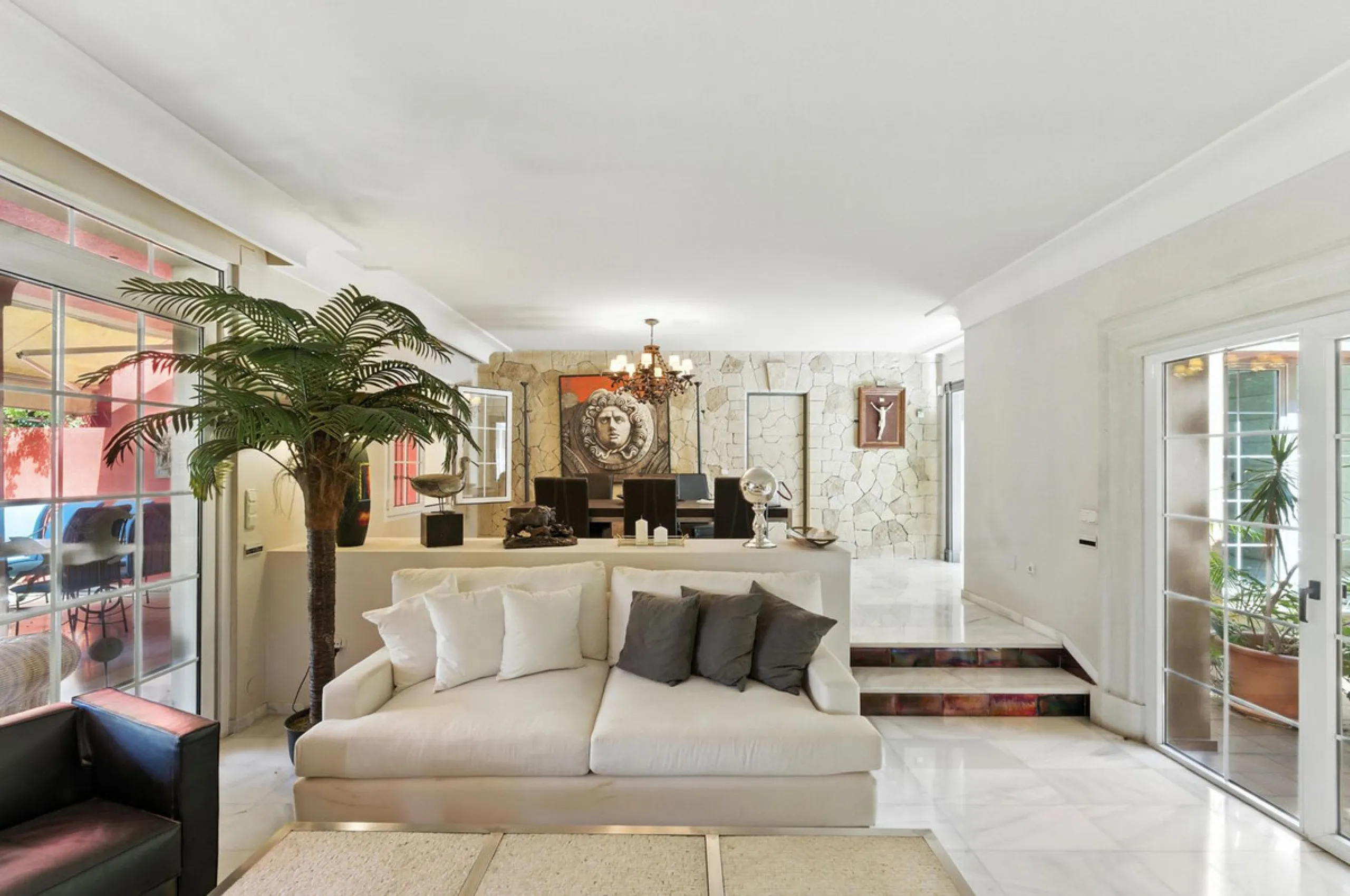 Discover the timeless charm of Andalusian architecture combined with modern luxury in this exceptional villa, ideally situated in the heart of Marbella Centro. Just a short walk from the historic Old Town and the beach, this magnificent single-family resi
