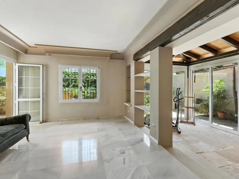 Discover the timeless charm of Andalusian architecture combined with modern luxury in this exceptional villa, ideally situated in the heart of Marbella Centro. Just a short walk from the historic Old Town and the beach, this magnificent single-family resi