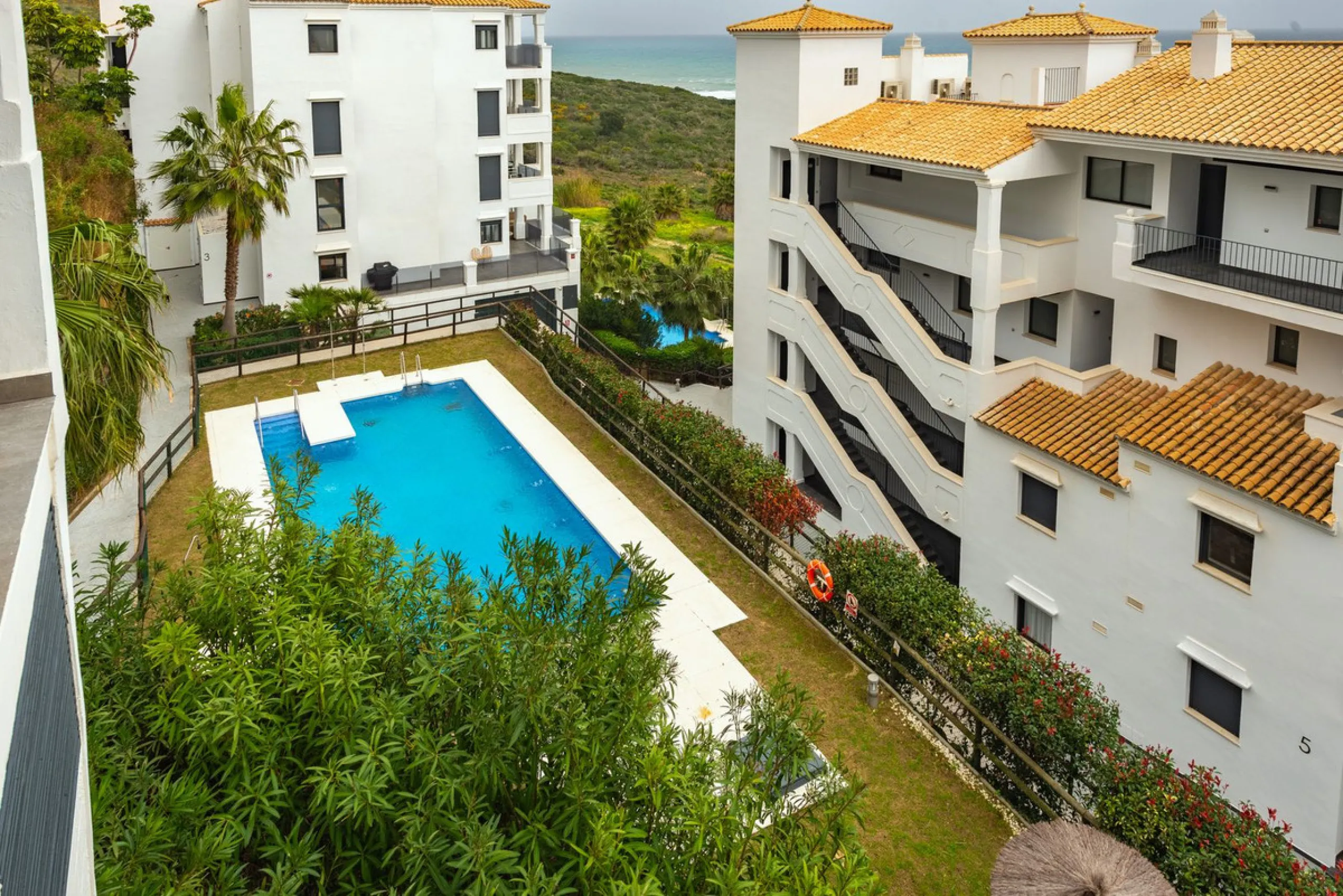SEA FACING DEVELOPMENT, WALK TO THE BEACHES.  Ideally located only 200 meters from the golden beach of Punta Paloma in Manilva and just a few minutes drive to the charming LA DUQUESA PORT & SOTOGRANDE with its restaurants, cafés and bars. This luxury 3 be