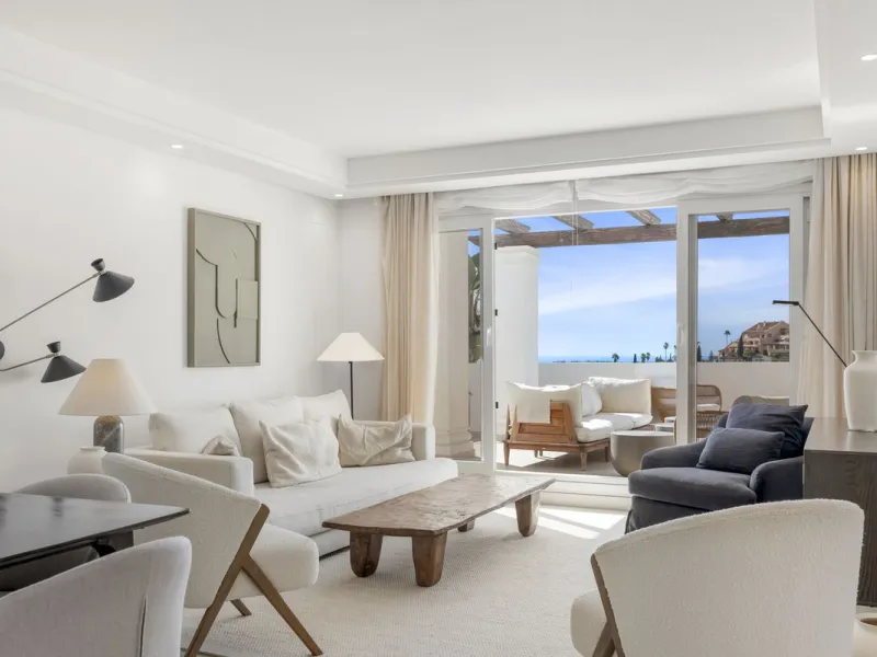 We are delighted to present this stunning first-floor apartment in Aloha, Nueva Andalucía, offering breathtaking panoramic views of the coastline. Formerly the show home of the development, this exceptional property is sold fully furnished and finished to