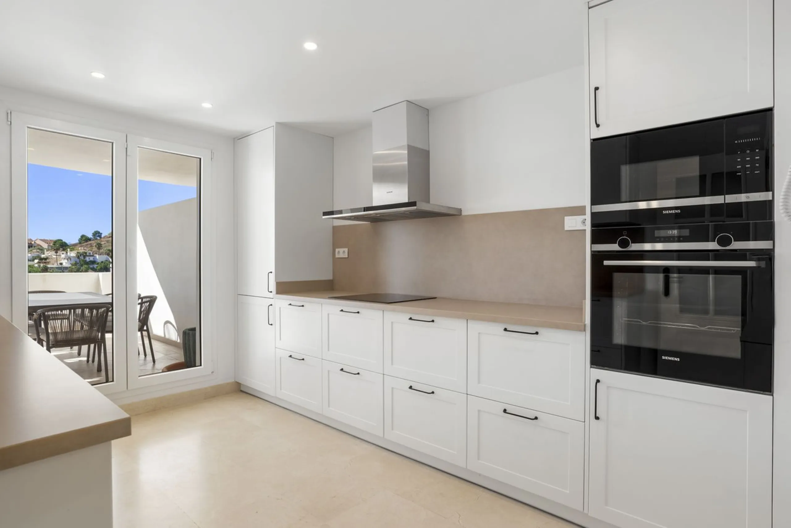 We are delighted to present this stunning first-floor apartment in Aloha, Nueva Andalucía, offering breathtaking panoramic views of the coastline. Formerly the show home of the development, this exceptional property is sold fully furnished and finished to