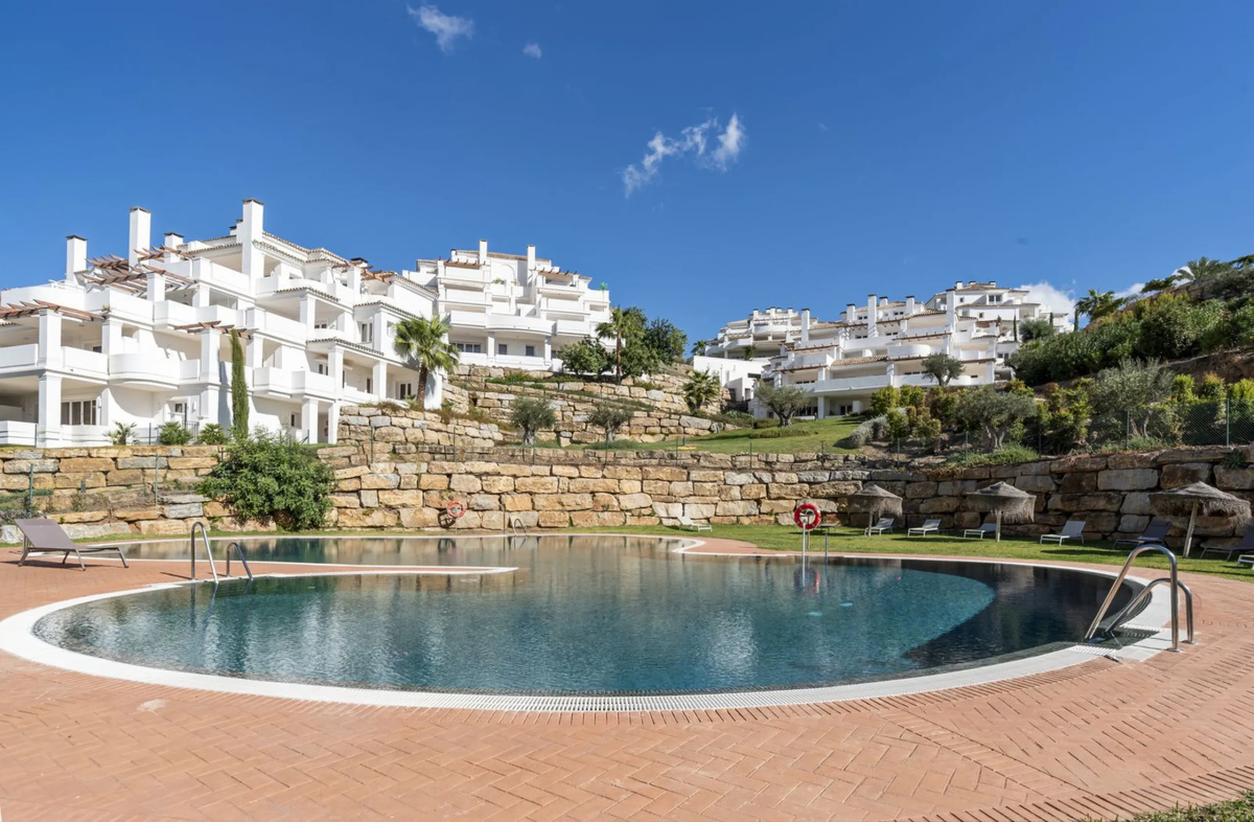 We are delighted to present this stunning first-floor apartment in Aloha, Nueva Andalucía, offering breathtaking panoramic views of the coastline. Formerly the show home of the development, this exceptional property is sold fully furnished and finished to