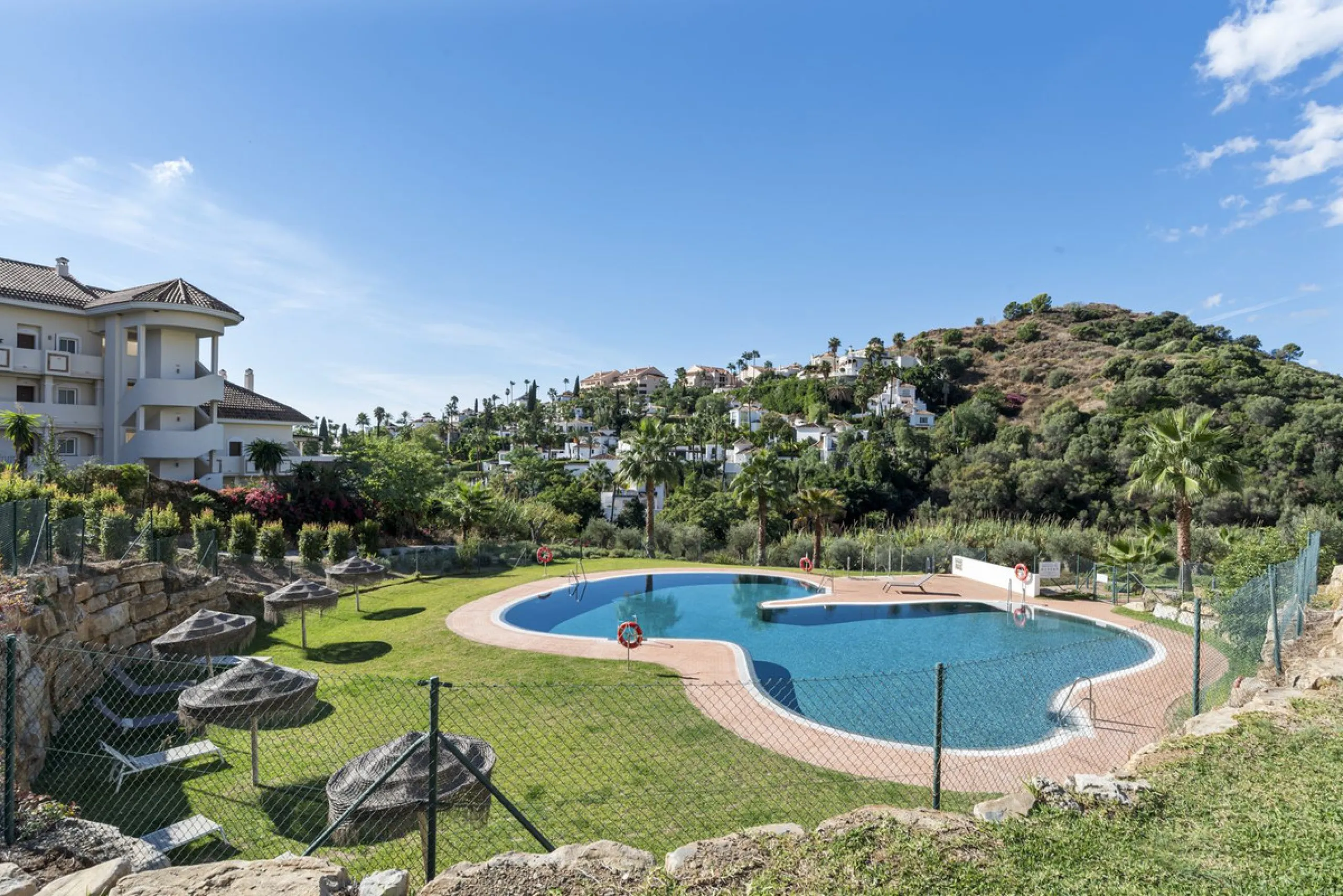 We are delighted to present this stunning first-floor apartment in Aloha, Nueva Andalucía, offering breathtaking panoramic views of the coastline. Formerly the show home of the development, this exceptional property is sold fully furnished and finished to