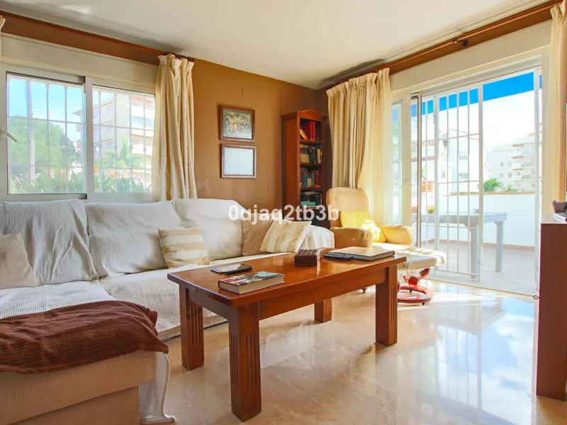 This magnificent property combines an unbeatable location with spacious interiors and a charming covered terrace — perfect for enjoying the Costa del Sol's wonderful climate all year round. Situated in one of the most sought-after areas of Nueva Andalucía