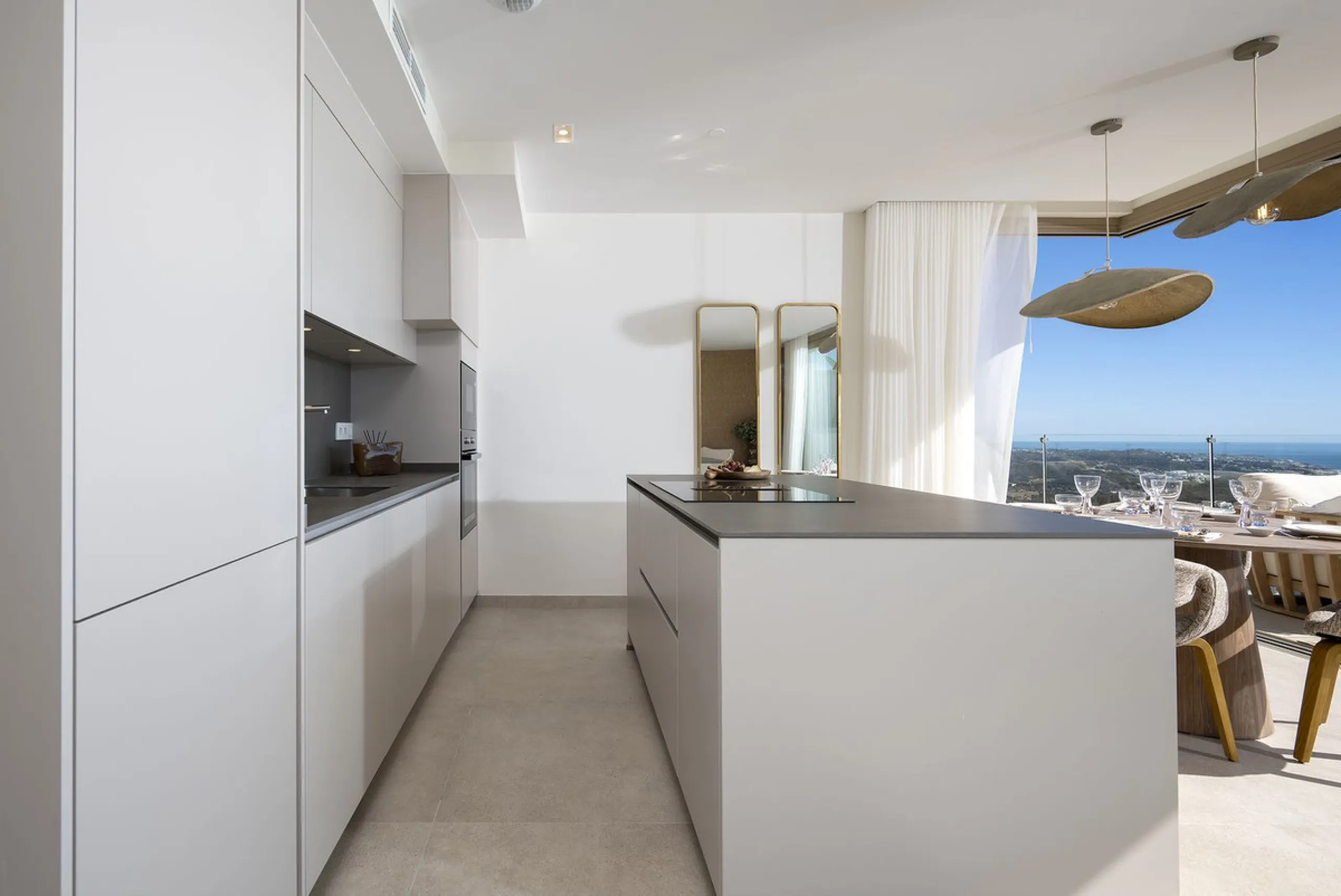 Amazing key ready 2-bedroom penthouse in La Cala de Mijas, boasting spectacular sea views. The upper level features a solarium with an outdoor kitchen and a jacuzzi. This boutique development prioritizes quality, functionality, and design, providing an ex