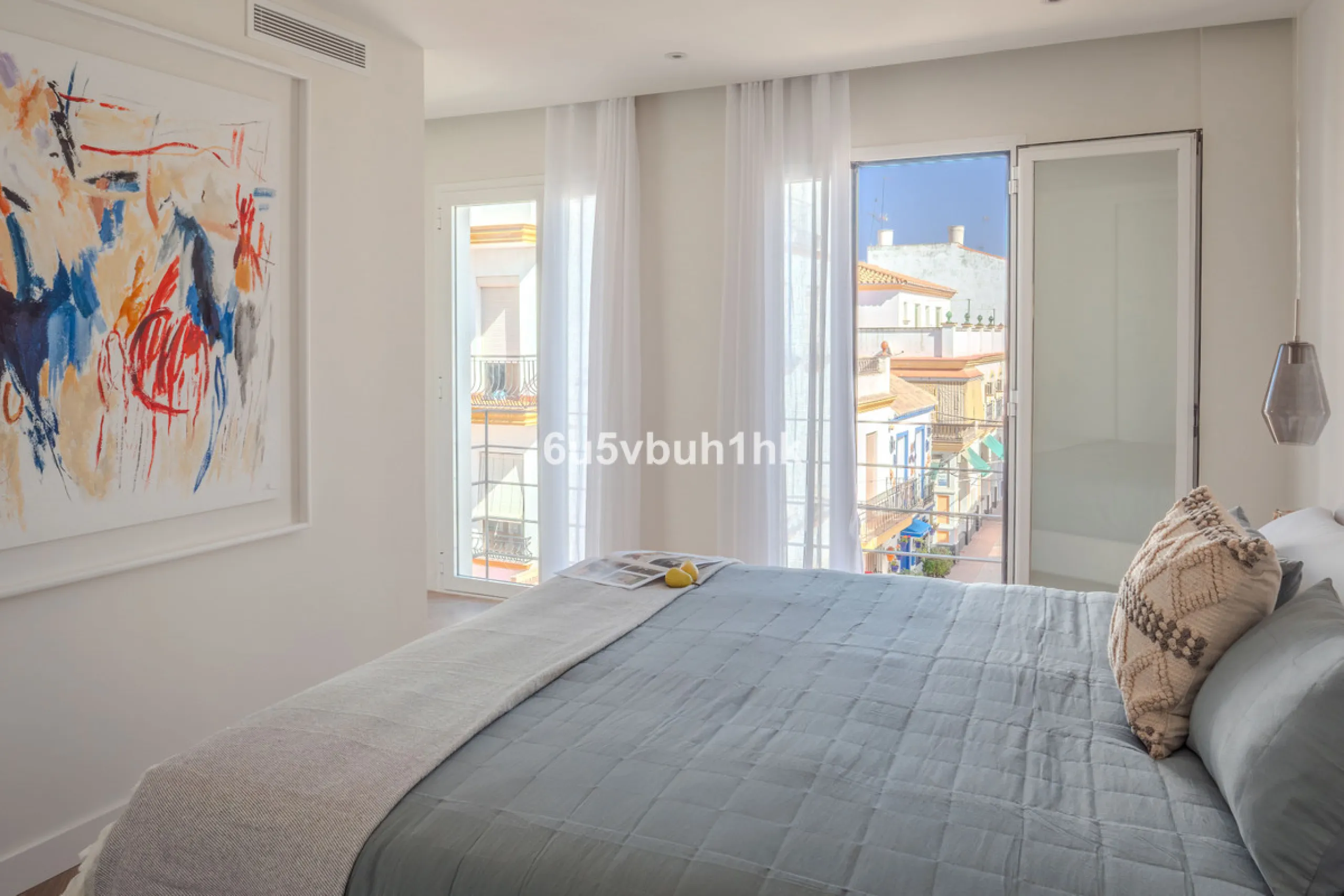 There is something very easy about this apartment. It sits on a bright corner in Estepona's historic centre, next to a plaza, with the life of the town just outside and the beach only a short walk away.