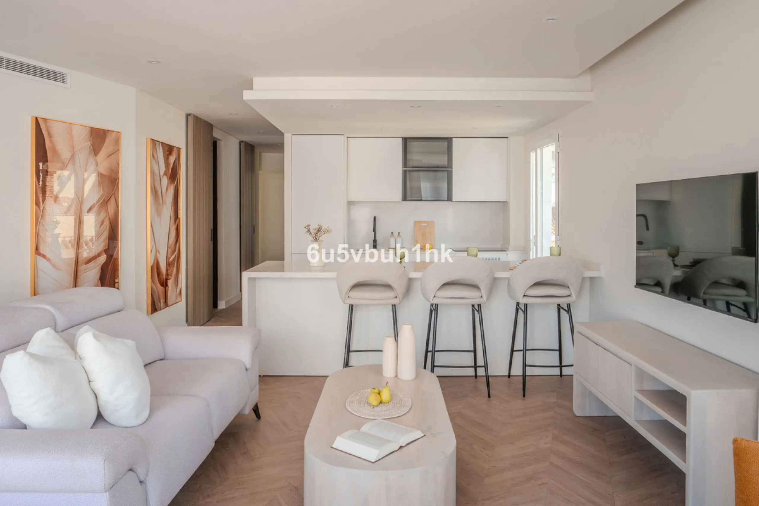 There is something very easy about this apartment. It sits on a bright corner in Estepona's historic centre, next to a plaza, with the life of the town just outside and the beach only a short walk away.