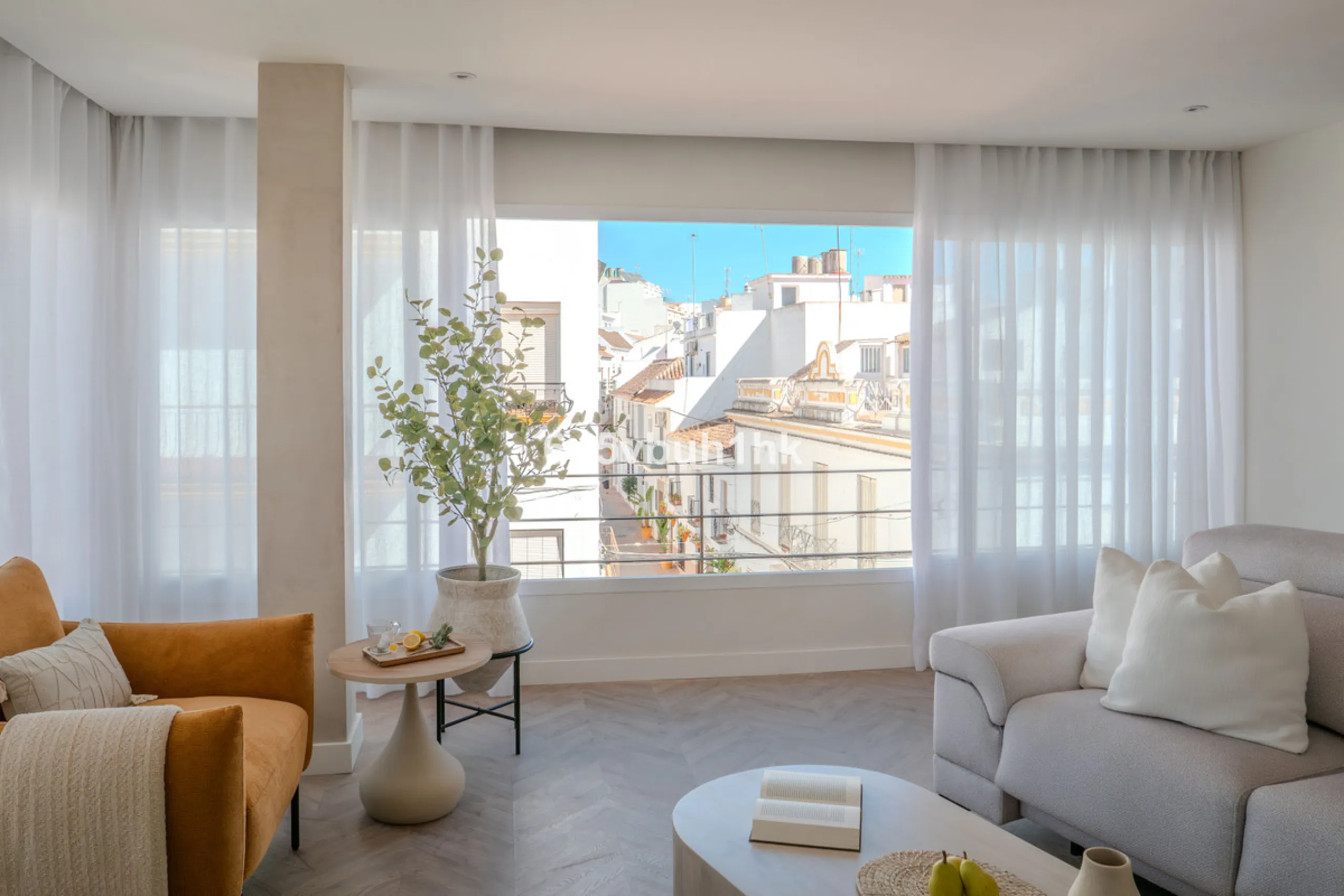 There is something very easy about this apartment. It sits on a bright corner in Estepona's historic centre, next to a plaza, with the life of the town just outside and the beach only a short walk away.