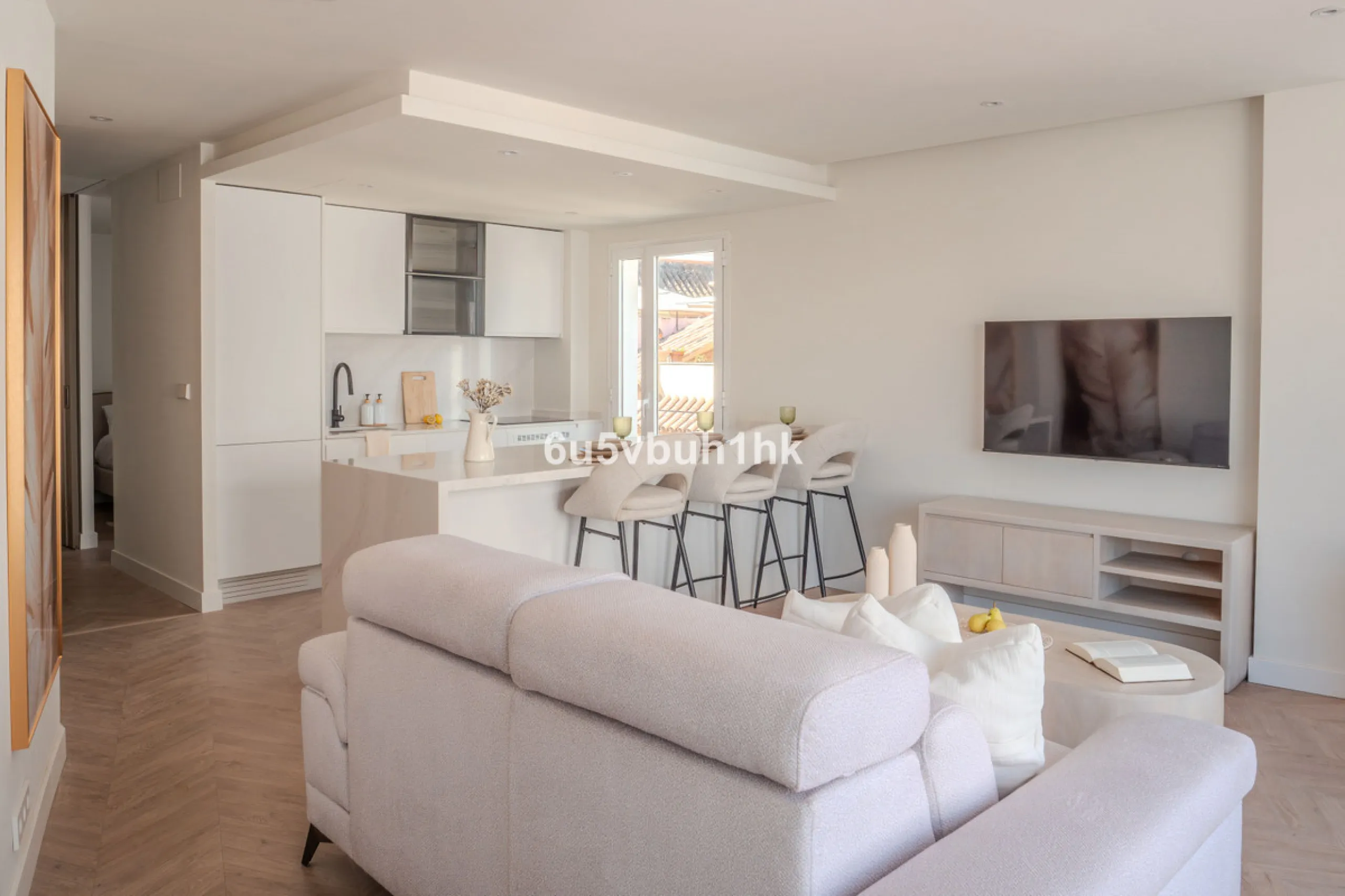 There is something very easy about this apartment. It sits on a bright corner in Estepona's historic centre, next to a plaza, with the life of the town just outside and the beach only a short walk away.