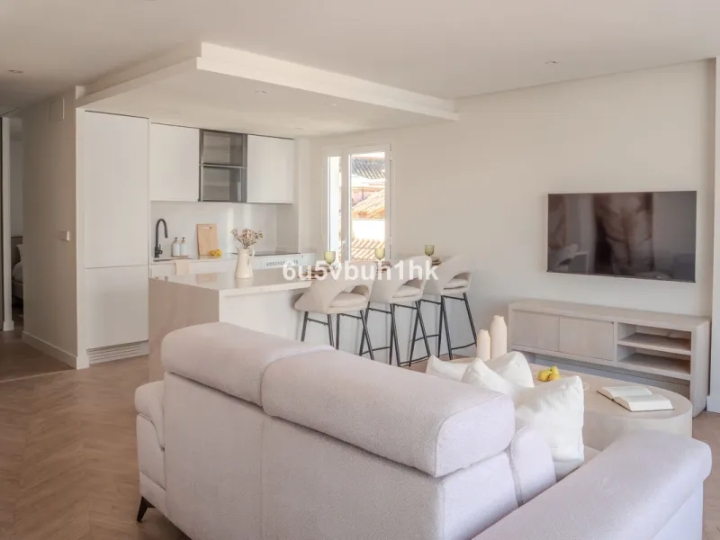 There is something very easy about this apartment. It sits on a bright corner in Estepona's historic centre, next to a plaza, with the life of the town just outside and the beach only a short walk away.