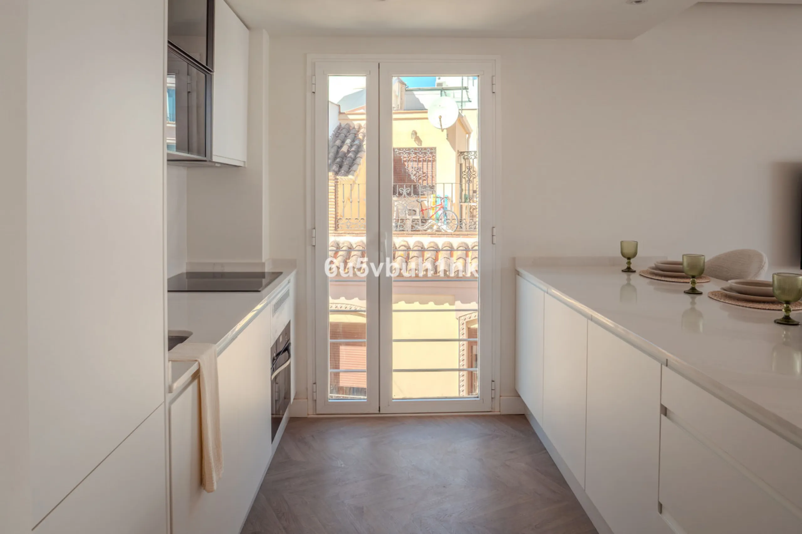 There is something very easy about this apartment. It sits on a bright corner in Estepona's historic centre, next to a plaza, with the life of the town just outside and the beach only a short walk away.