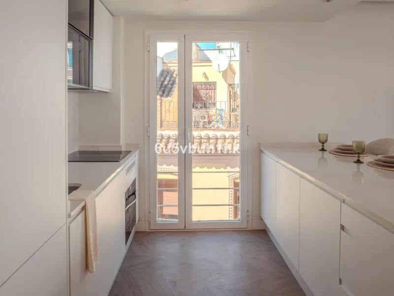 There is something very easy about this apartment. It sits on a bright corner in Estepona's historic centre, next to a plaza, with the life of the town just outside and the beach only a short walk away.