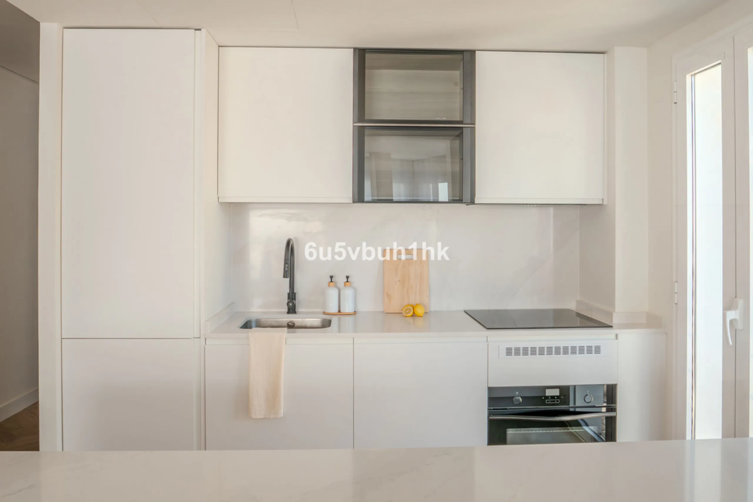 There is something very easy about this apartment. It sits on a bright corner in Estepona's historic centre, next to a plaza, with the life of the town just outside and the beach only a short walk away.