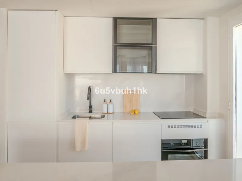 There is something very easy about this apartment. It sits on a bright corner in Estepona's historic centre, next to a plaza, with the life of the town just outside and the beach only a short walk away.