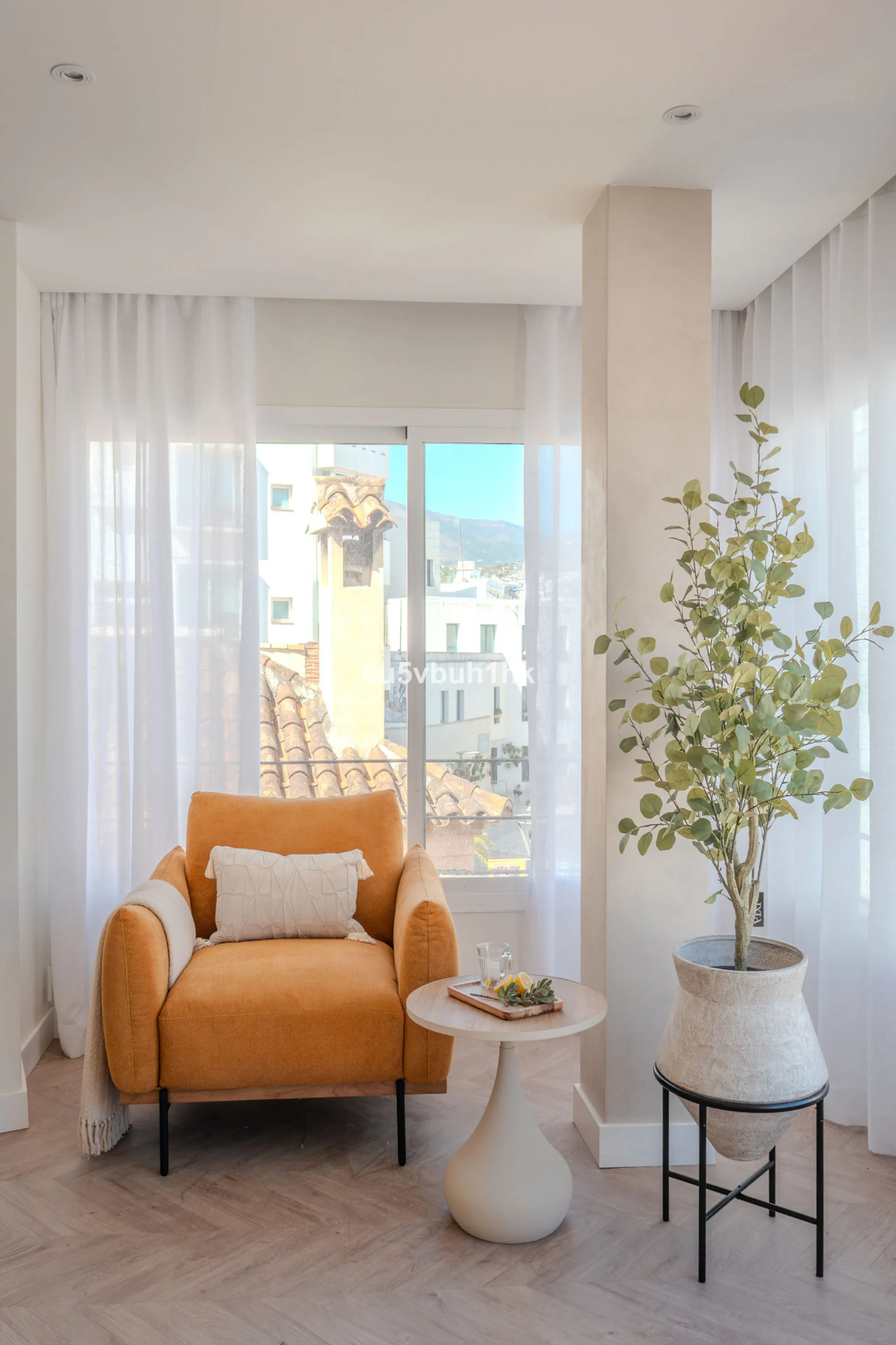 There is something very easy about this apartment. It sits on a bright corner in Estepona's historic centre, next to a plaza, with the life of the town just outside and the beach only a short walk away.
