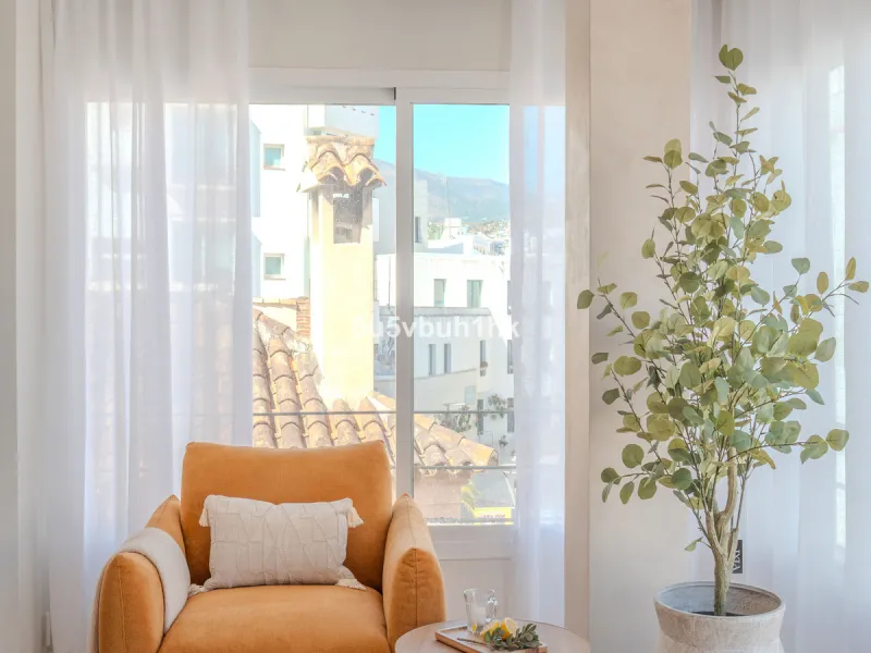 There is something very easy about this apartment. It sits on a bright corner in Estepona's historic centre, next to a plaza, with the life of the town just outside and the beach only a short walk away.
