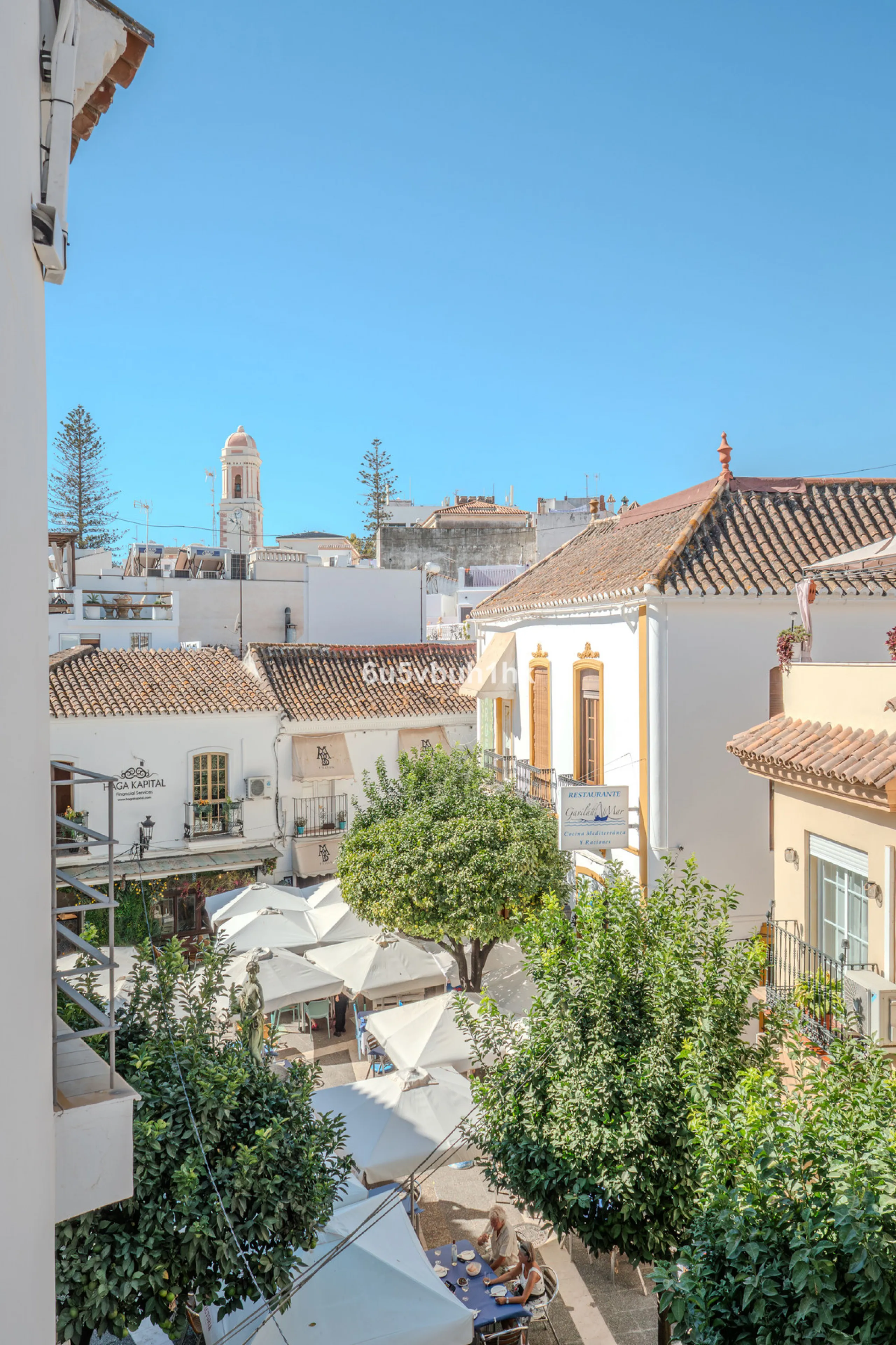 There is something very easy about this apartment. It sits on a bright corner in Estepona's historic centre, next to a plaza, with the life of the town just outside and the beach only a short walk away.