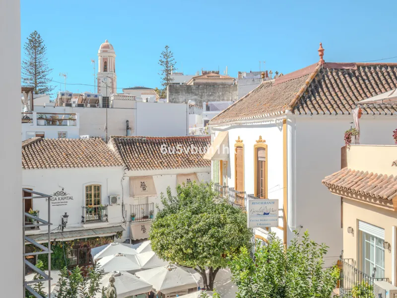 There is something very easy about this apartment. It sits on a bright corner in Estepona's historic centre, next to a plaza, with the life of the town just outside and the beach only a short walk away.