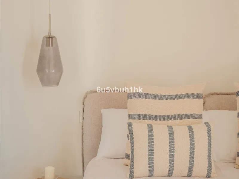 There is something very easy about this apartment. It sits on a bright corner in Estepona's historic centre, next to a plaza, with the life of the town just outside and the beach only a short walk away.