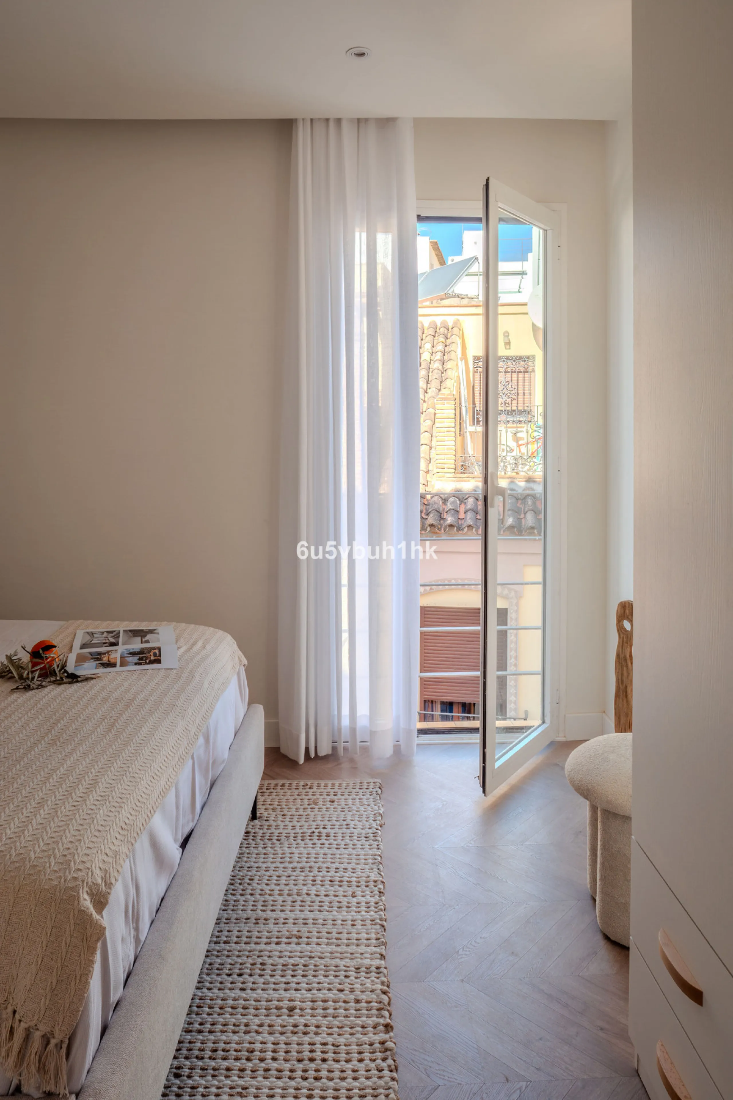 There is something very easy about this apartment. It sits on a bright corner in Estepona's historic centre, next to a plaza, with the life of the town just outside and the beach only a short walk away.