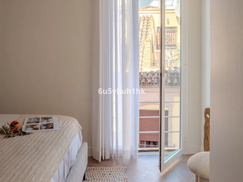 There is something very easy about this apartment. It sits on a bright corner in Estepona's historic centre, next to a plaza, with the life of the town just outside and the beach only a short walk away.