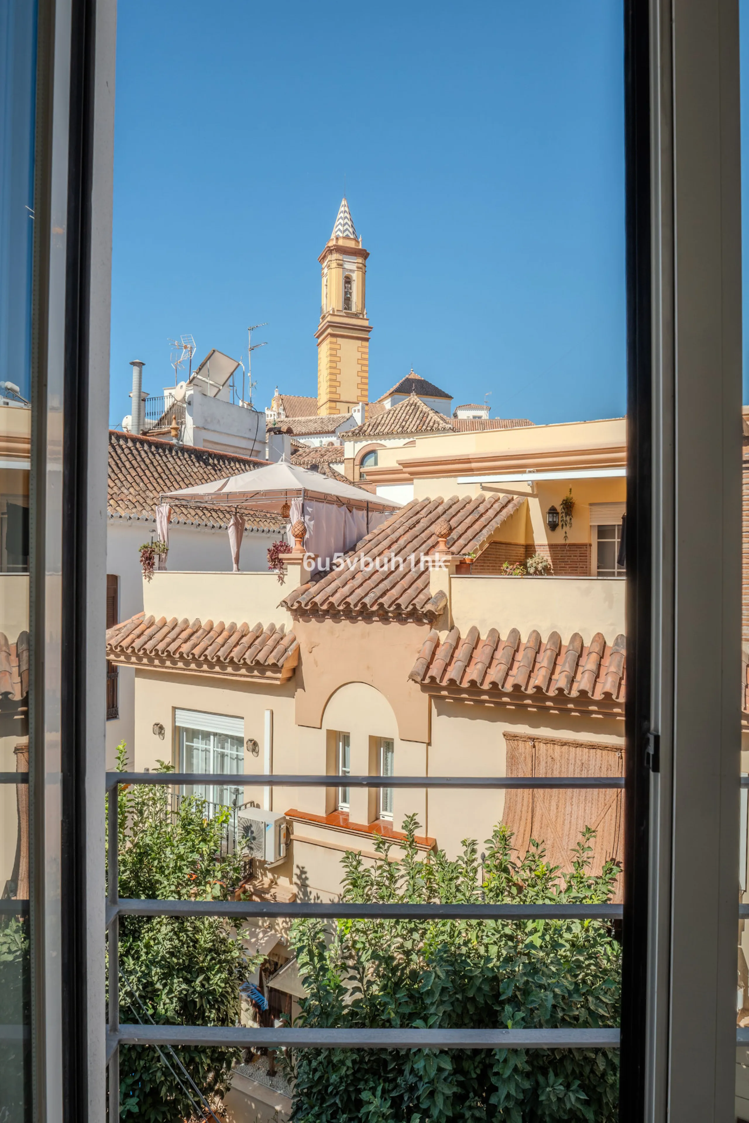 There is something very easy about this apartment. It sits on a bright corner in Estepona's historic centre, next to a plaza, with the life of the town just outside and the beach only a short walk away.