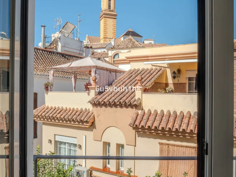 There is something very easy about this apartment. It sits on a bright corner in Estepona's historic centre, next to a plaza, with the life of the town just outside and the beach only a short walk away.