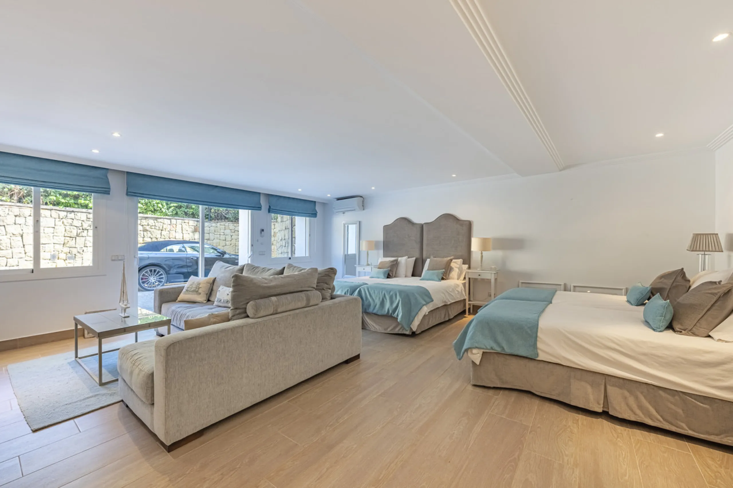 Set in the prestigious gated community of La Reserva de La Quinta in Benahavís, this Andalusian-inspired villa combines timeless architecture with a privileged frontline golf position. Surrounded by lush greenery, the property offers complete privacy, ele