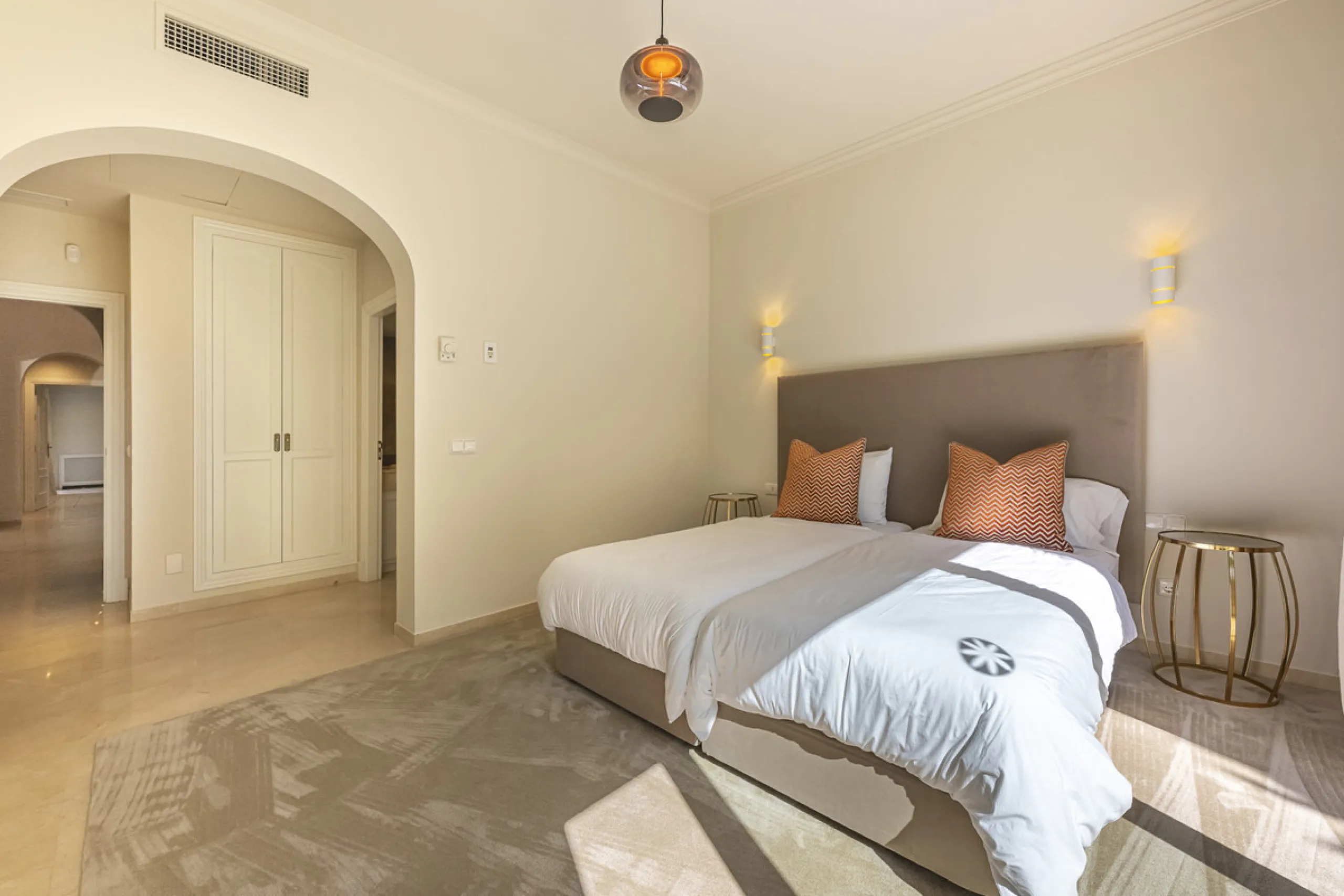 Set in the prestigious gated community of La Reserva de La Quinta in Benahavís, this Andalusian-inspired villa combines timeless architecture with a privileged frontline golf position. Surrounded by lush greenery, the property offers complete privacy, ele