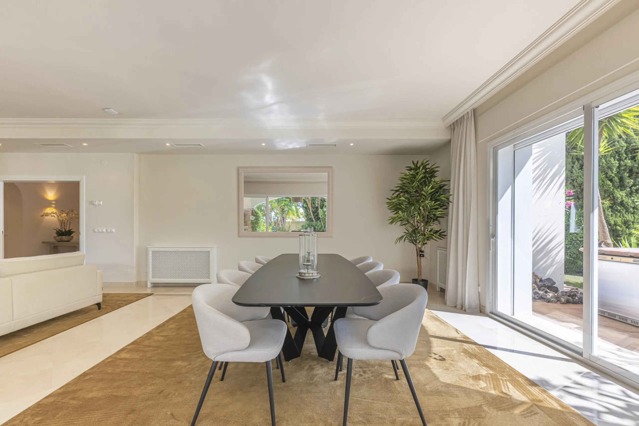 Set in the prestigious gated community of La Reserva de La Quinta in Benahavís, this Andalusian-inspired villa combines timeless architecture with a privileged frontline golf position. Surrounded by lush greenery, the property offers complete privacy, ele