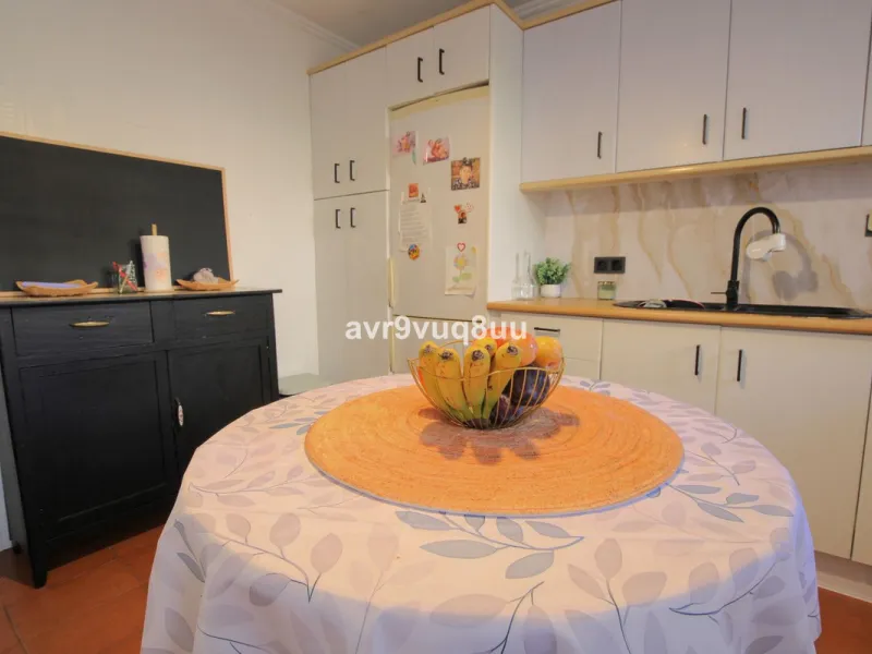 Large family home located in within walking of all the amenities in the area of El Coto.  The ground floor has a large lounge diner, separate fully fitted kitchen, guest toilet, a generous private terrace and upstairs you will find 4 huge bedrooms and a f