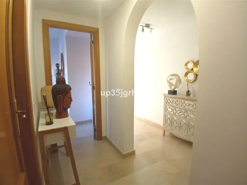 Next to one of the most sought-after areas between Estepona & Marbella, I present to you an exclusive, beautiful apartment for sale or long-term rental, with 2 spacious bedrooms and two bathrooms, one of them en-suite, and a fully furnished and equipped k