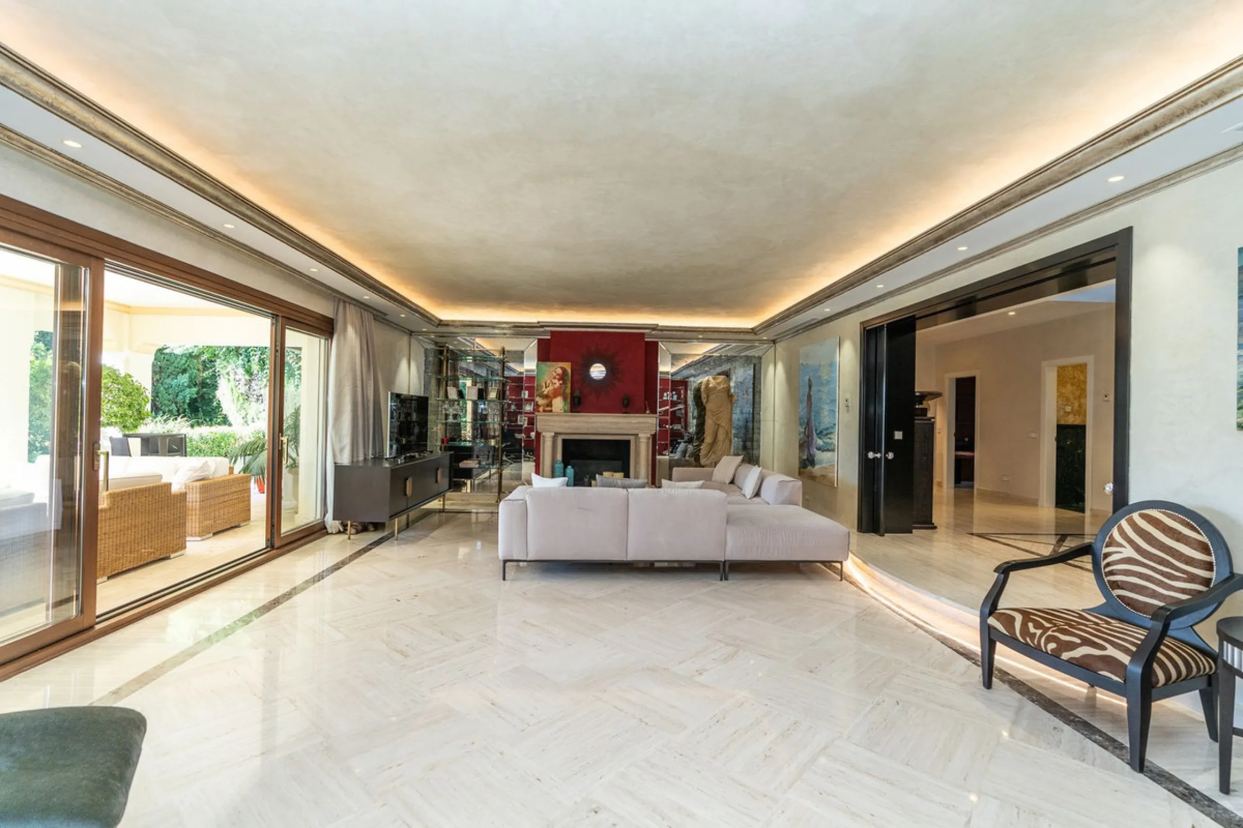 Situated on one of the most prestigious roads in Sierra Blanca, this magnificent villa embodies the essence of Marbella luxury living. Set on an expansive plot of almost 2,000 m², the property enjoys total privacy, lush gardens, and breathtaking sea views