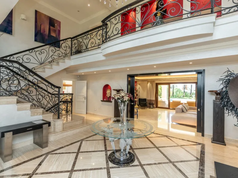 Situated on one of the most prestigious roads in Sierra Blanca, this magnificent villa embodies the essence of Marbella luxury living. Set on an expansive plot of almost 2,000 m², the property enjoys total privacy, lush gardens, and breathtaking sea views