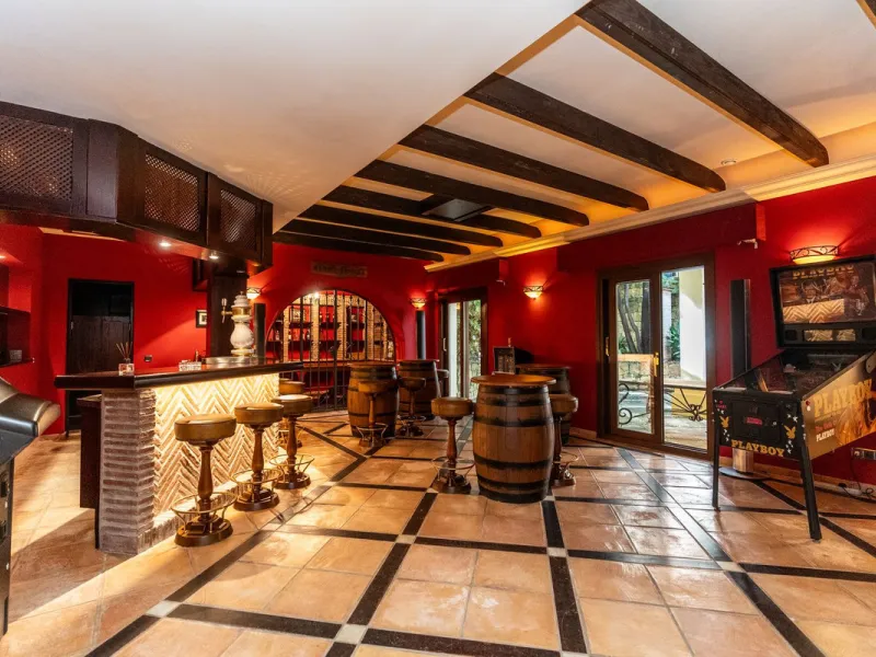 Situated on one of the most prestigious roads in Sierra Blanca, this magnificent villa embodies the essence of Marbella luxury living. Set on an expansive plot of almost 2,000 m², the property enjoys total privacy, lush gardens, and breathtaking sea views