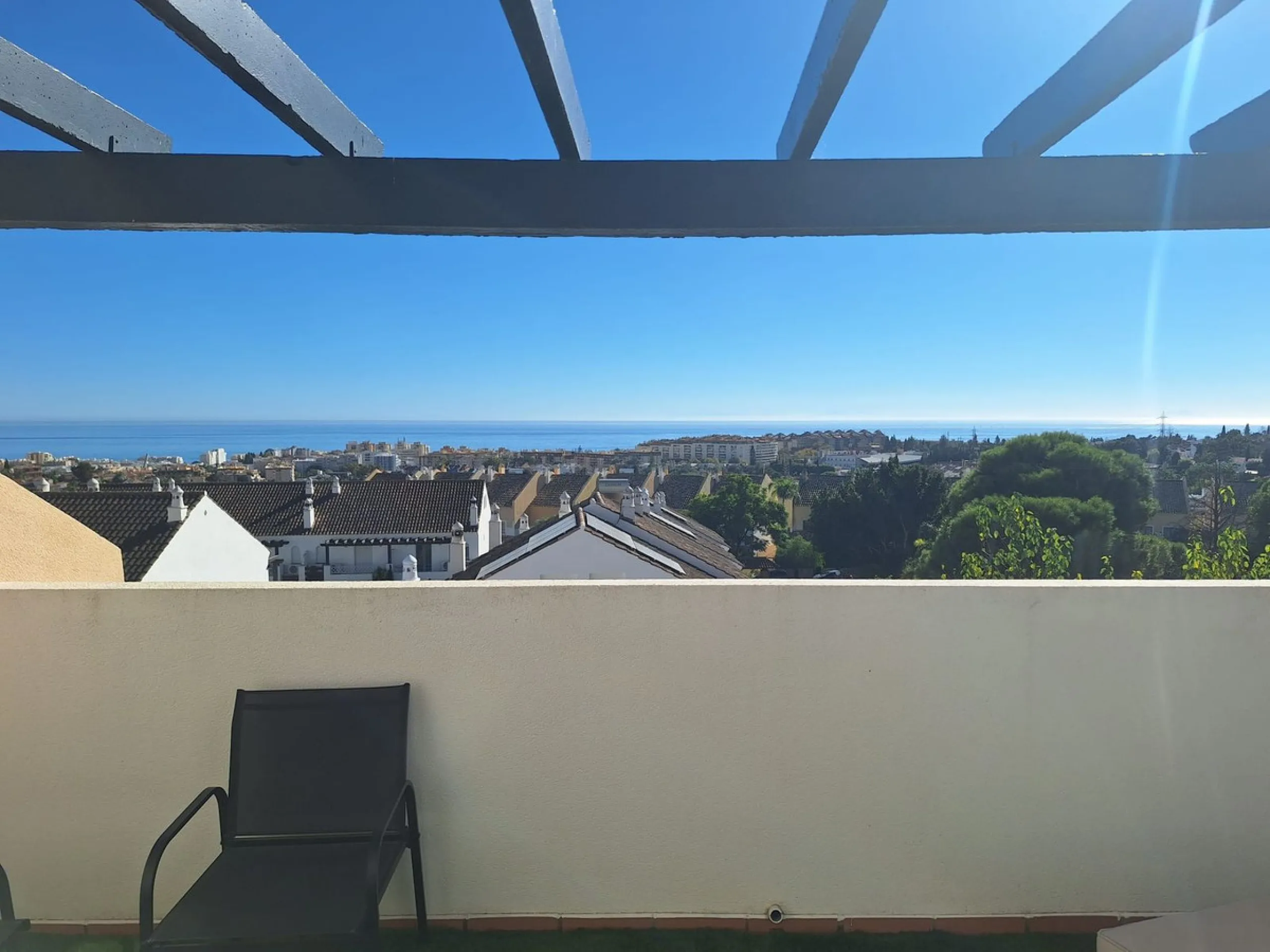 Discover unparalleled coastal serenity in this magnificent semi-detached townhouse within the prestigious Sierramar III urbanisation, a secure gated enclave in Marbella's exclusive Huerta del Prado-La Montúa district, nestled against the foothills of the 