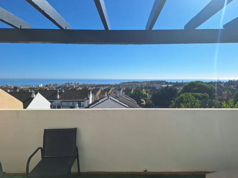 Discover unparalleled coastal serenity in this magnificent semi-detached townhouse within the prestigious Sierramar III urbanisation, a secure gated enclave in Marbella's exclusive Huerta del Prado-La Montúa district, nestled against the foothills of the 