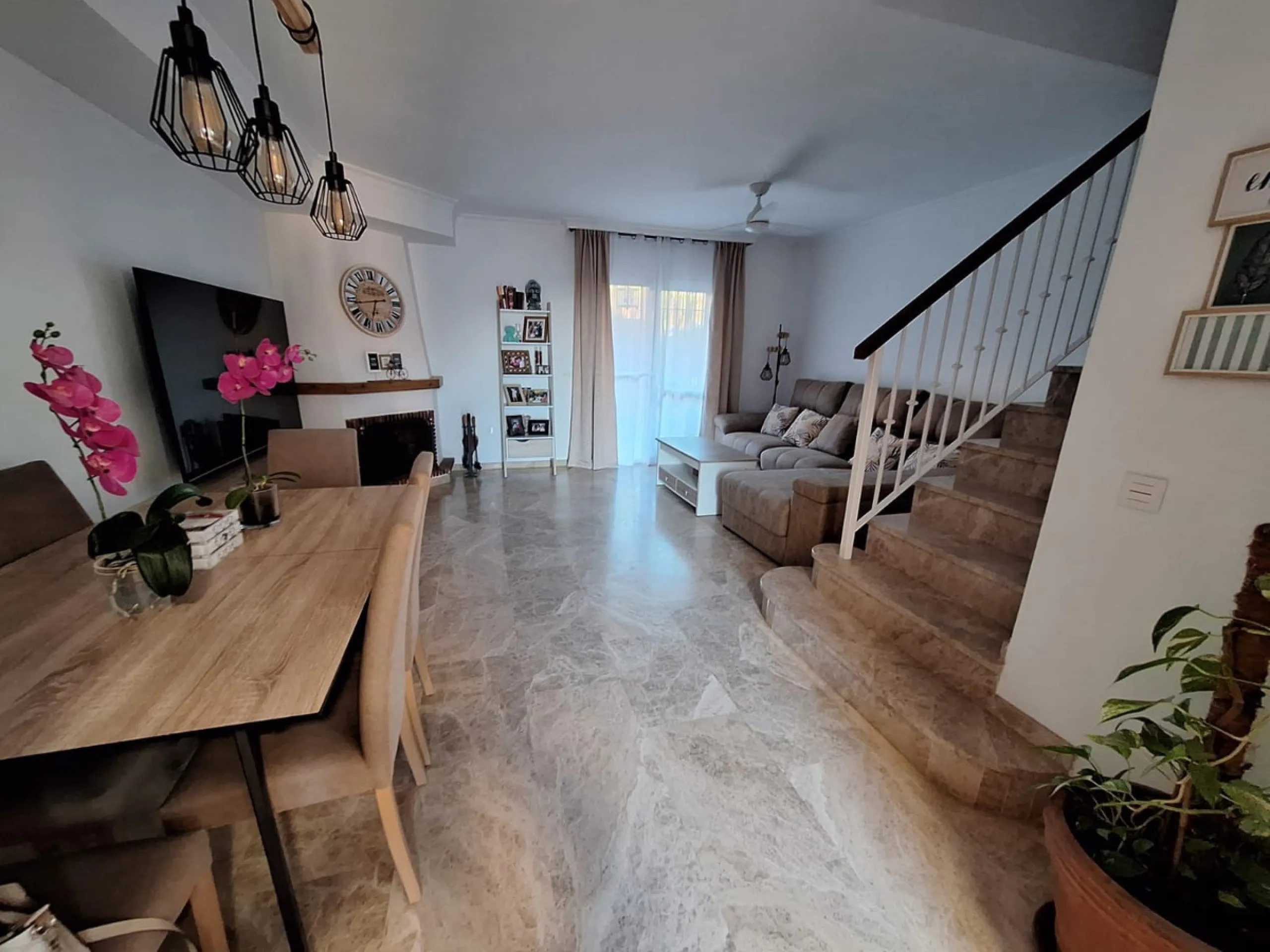 Discover unparalleled coastal serenity in this magnificent semi-detached townhouse within the prestigious Sierramar III urbanisation, a secure gated enclave in Marbella's exclusive Huerta del Prado-La Montúa district, nestled against the foothills of the 