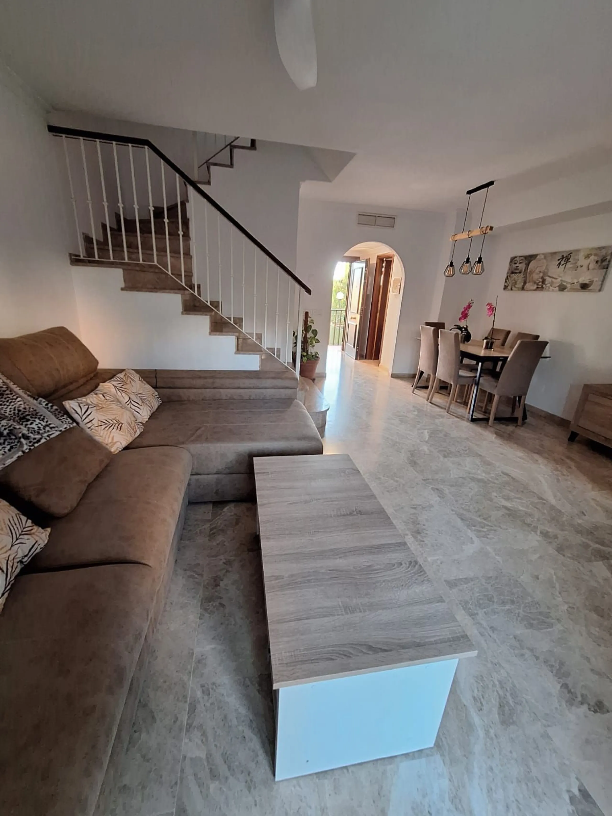 Discover unparalleled coastal serenity in this magnificent semi-detached townhouse within the prestigious Sierramar III urbanisation, a secure gated enclave in Marbella's exclusive Huerta del Prado-La Montúa district, nestled against the foothills of the 