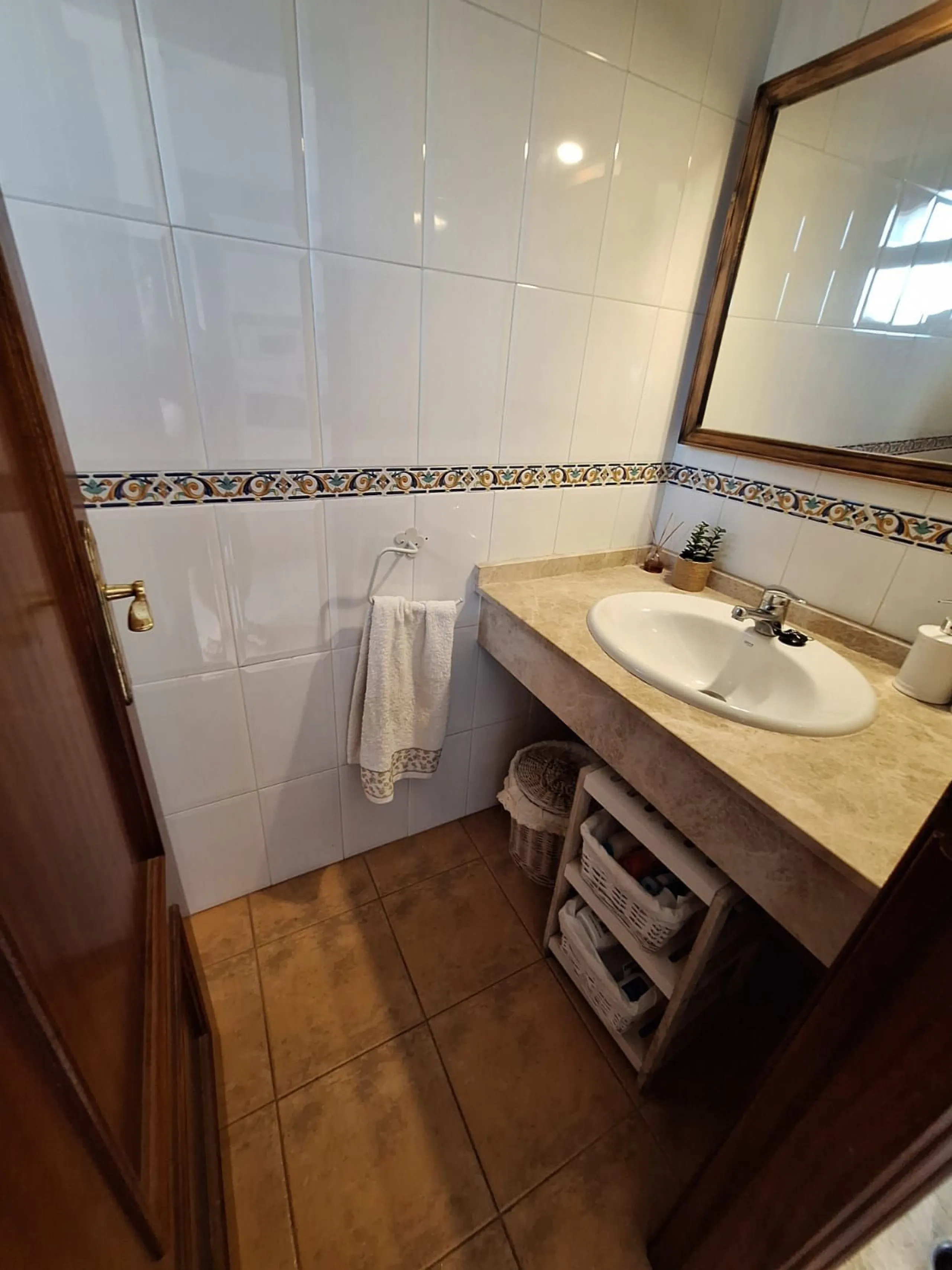 Discover unparalleled coastal serenity in this magnificent semi-detached townhouse within the prestigious Sierramar III urbanisation, a secure gated enclave in Marbella's exclusive Huerta del Prado-La Montúa district, nestled against the foothills of the 